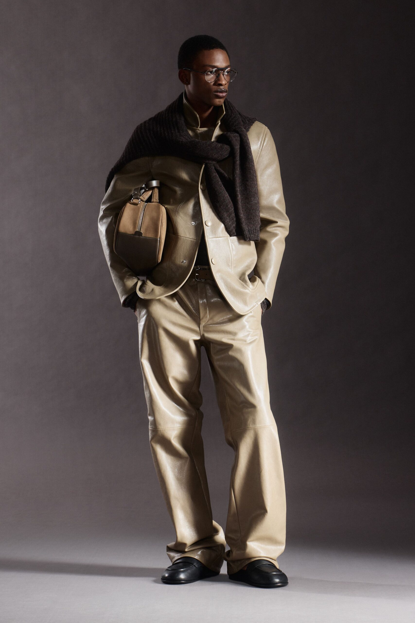 beige leather suit with scarf
