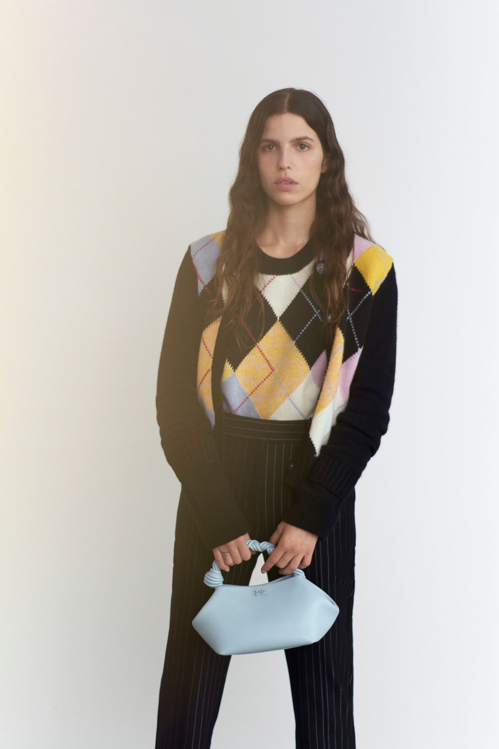 black striped pants with argyle sweater