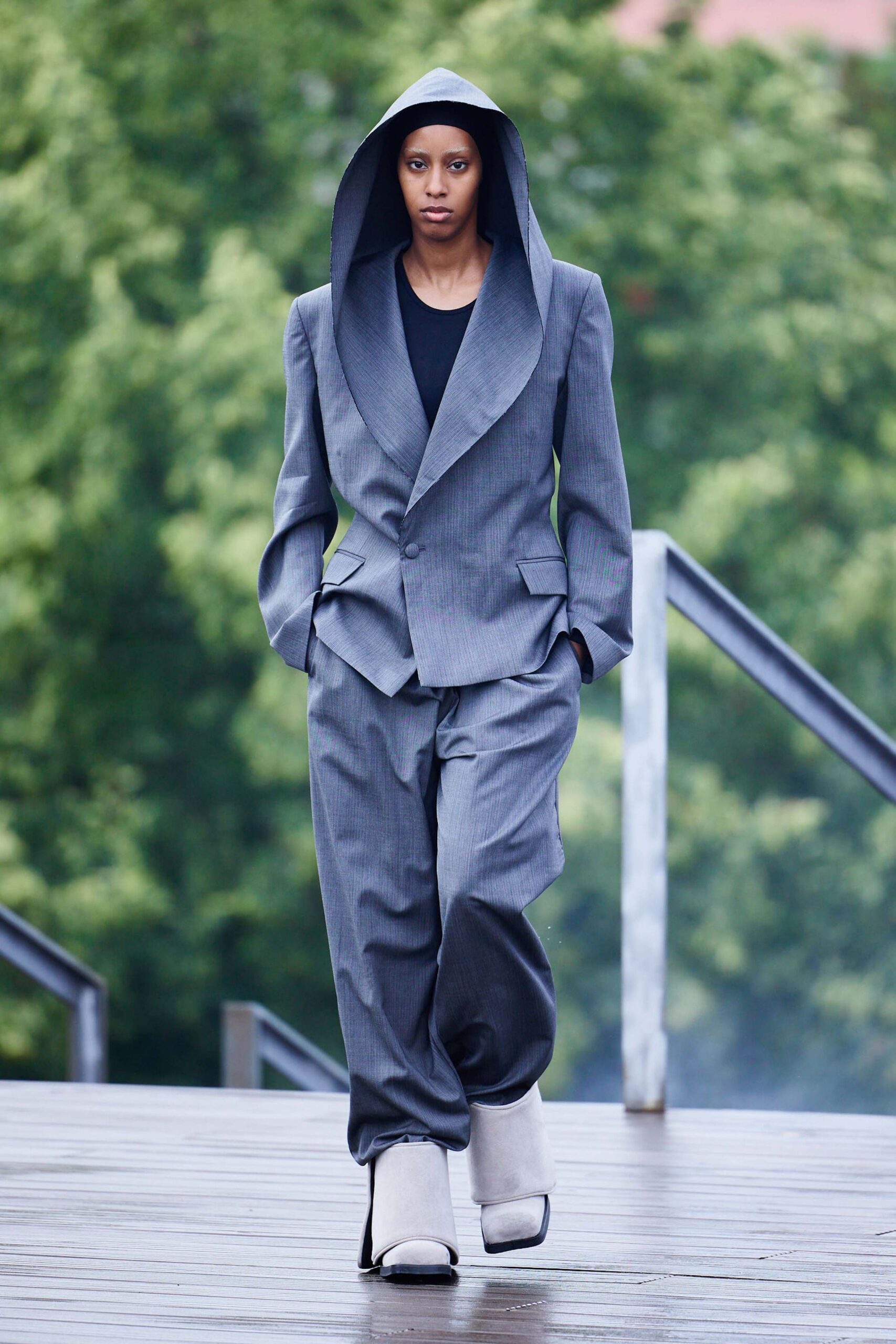 gray hooded suit with black top