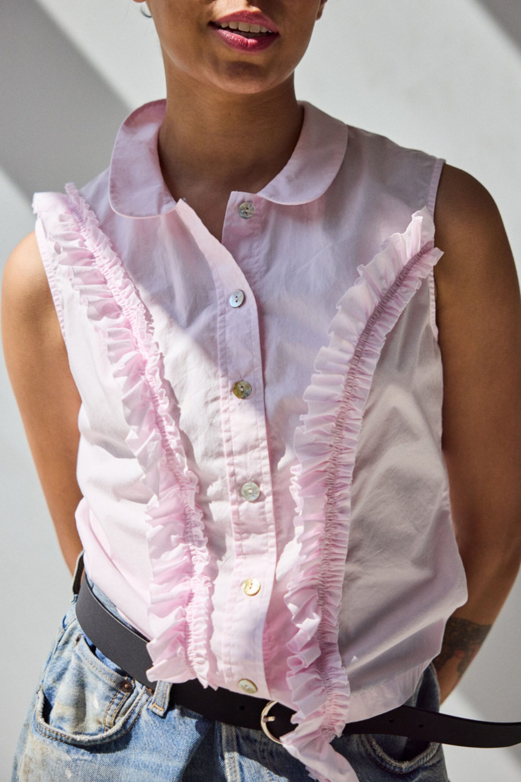 pink cotton sleeveless collared fitted ruffled shirt