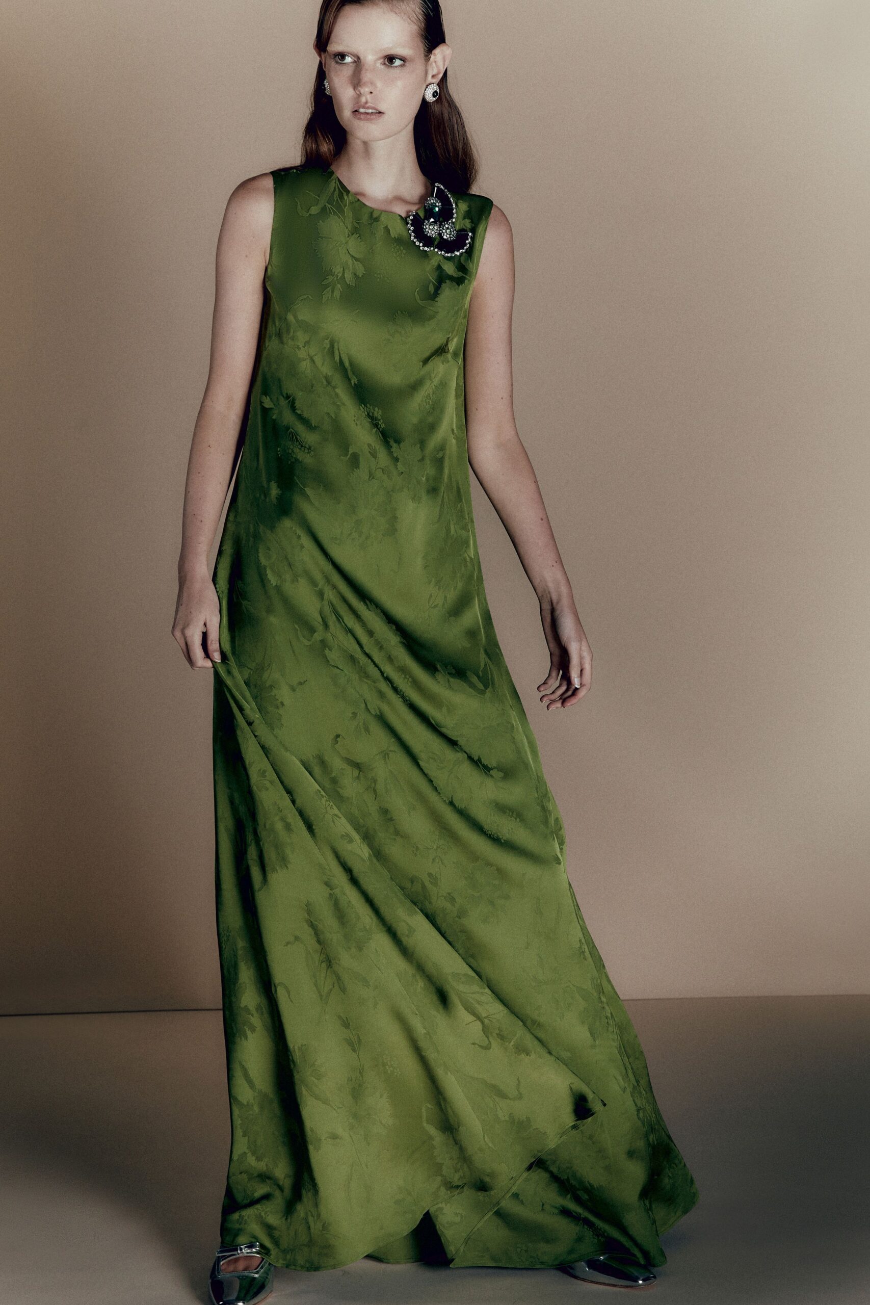 green silk sleeveless gown