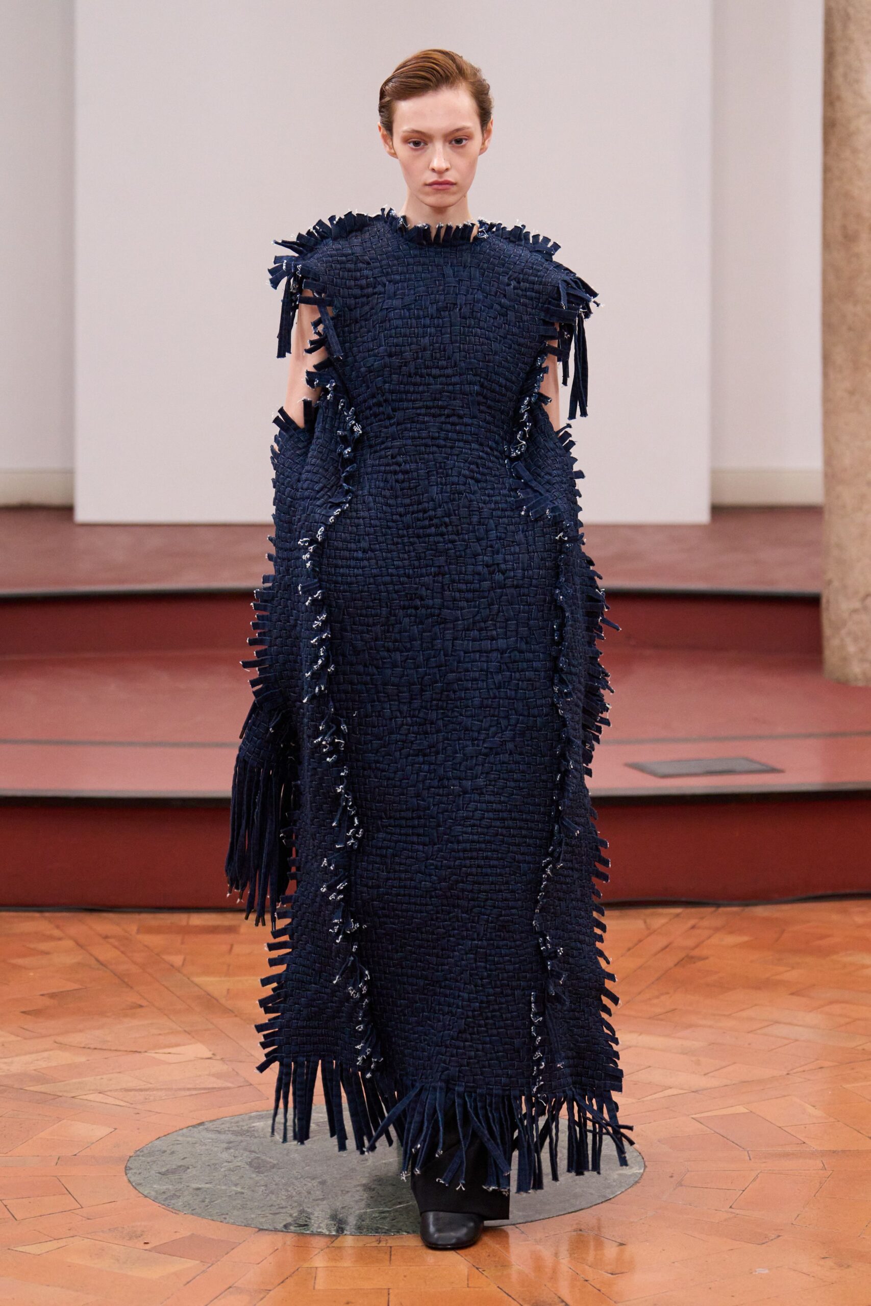 navy fringed gown with black shoes