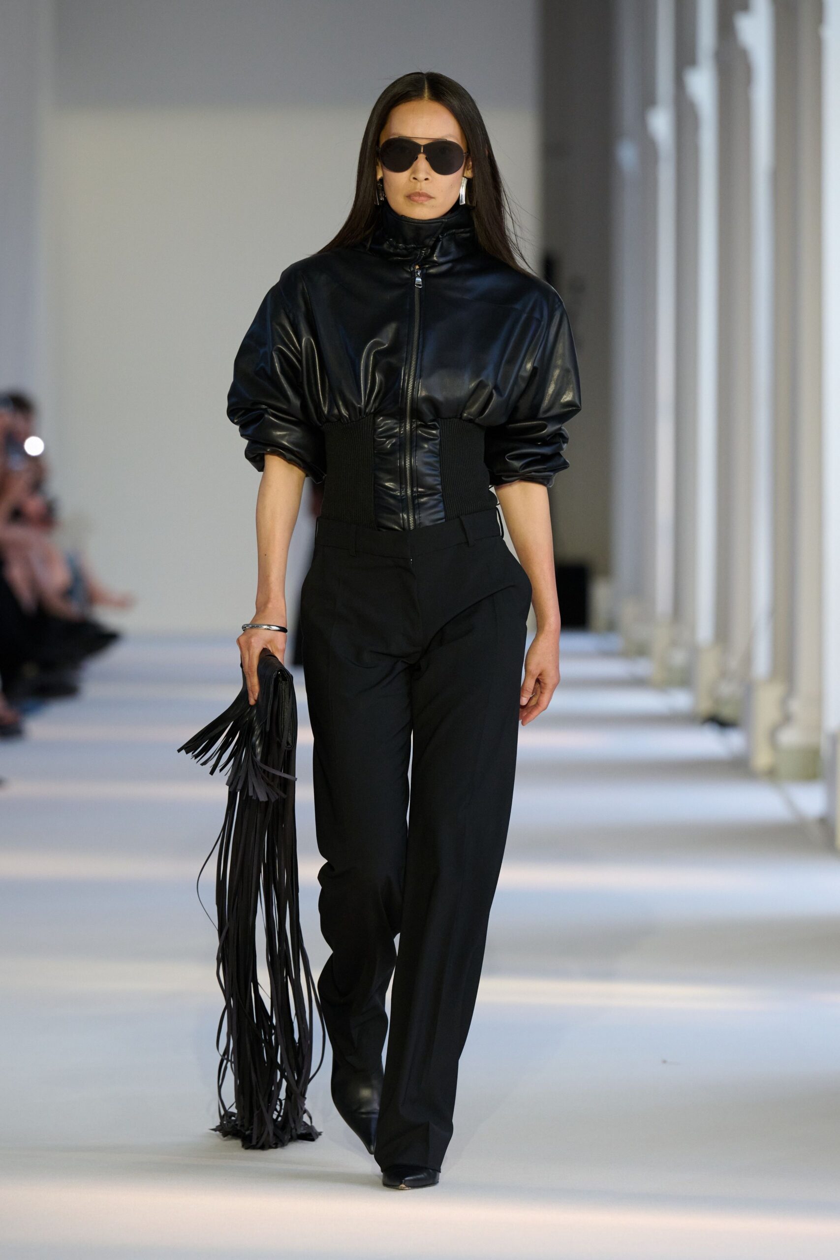 black leather fitted jacket and tailored pants
