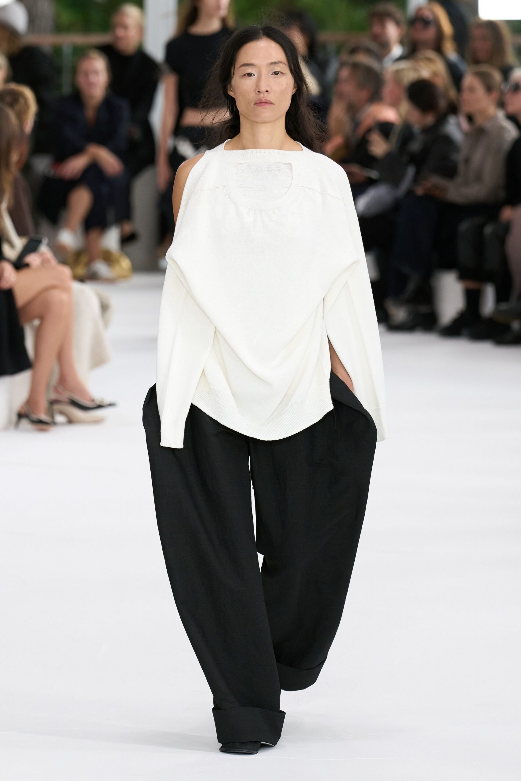 white relaxed top and black pants