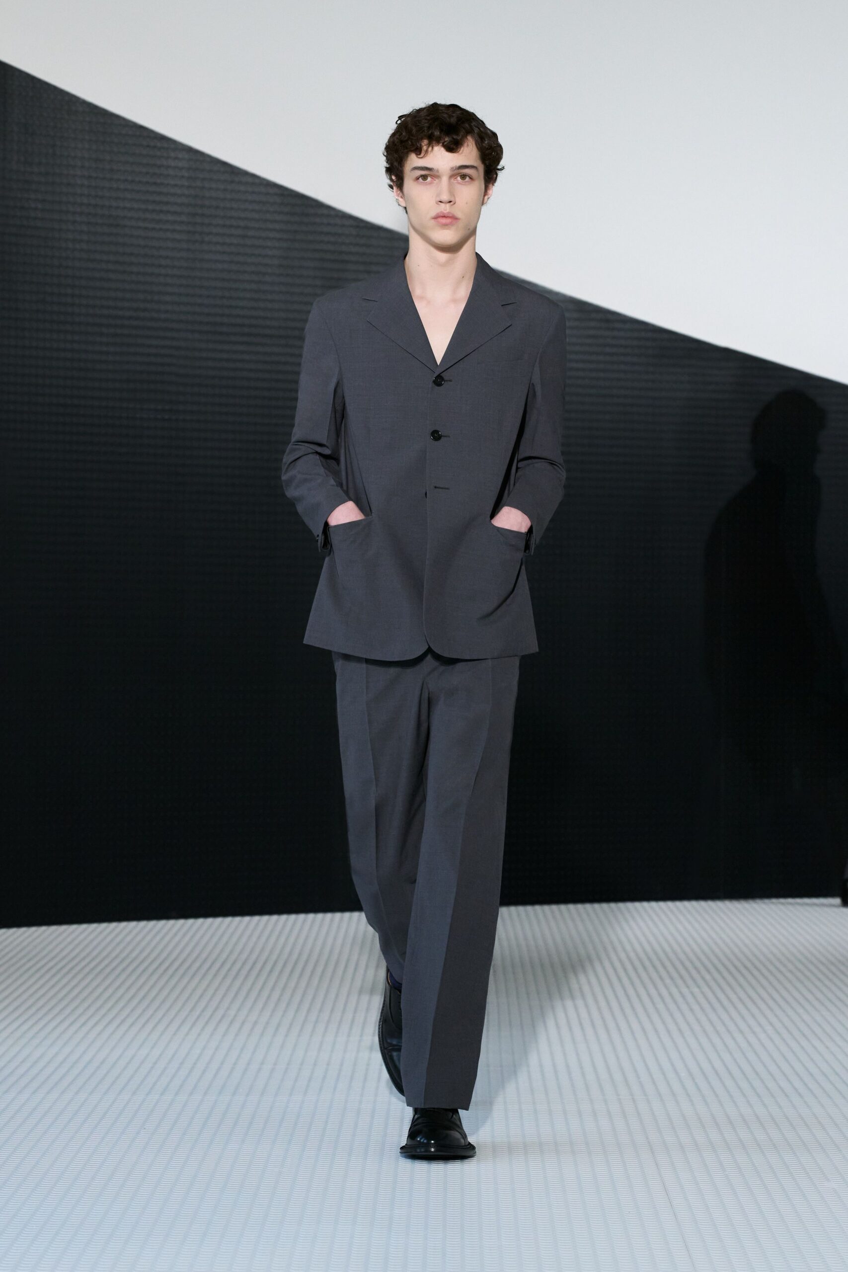 gray tailored suit with black shoes