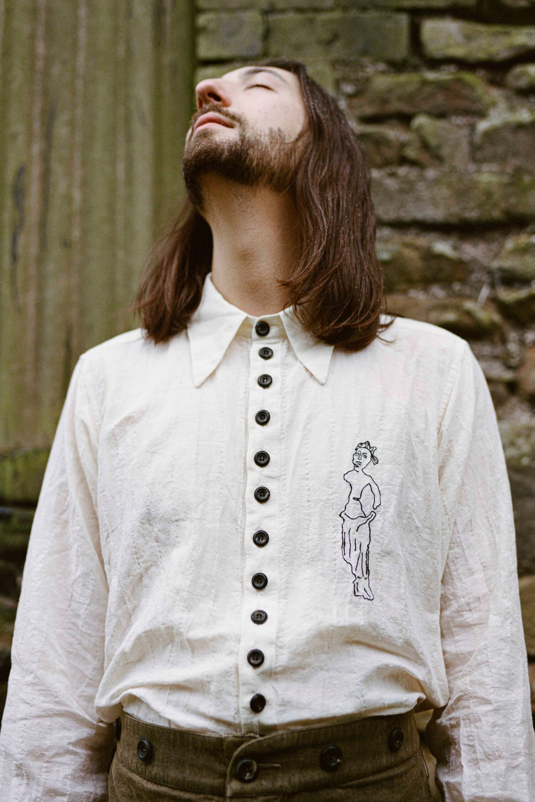 white relaxed shirt with embroidery