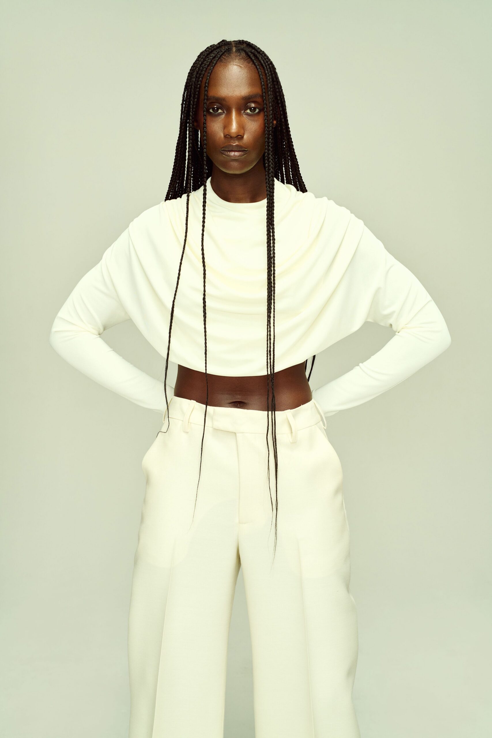 white cotton long-sleeve scoop-neck fitted draped cropped top