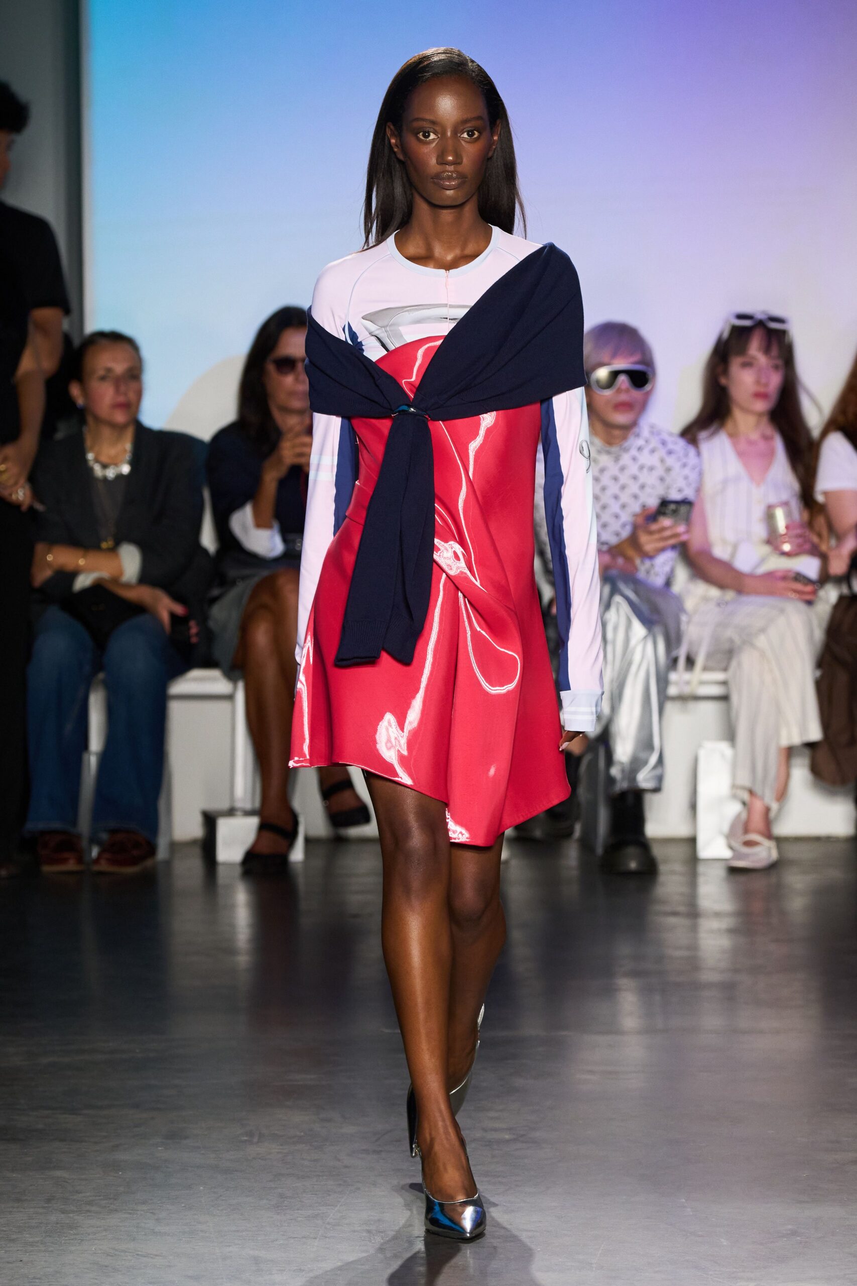 red printed mini dress with navy sweater
