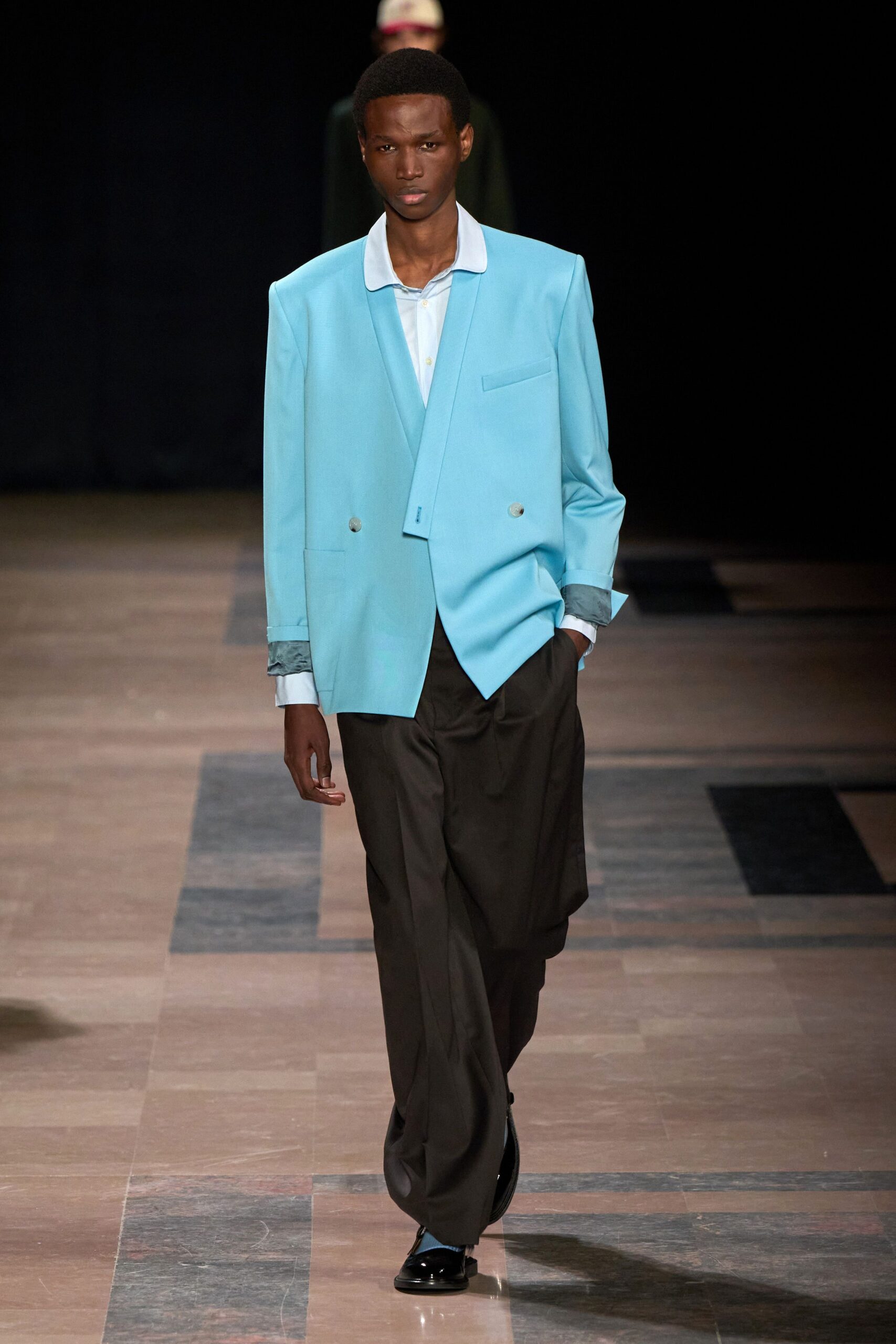 blue tailored blazer with black pants