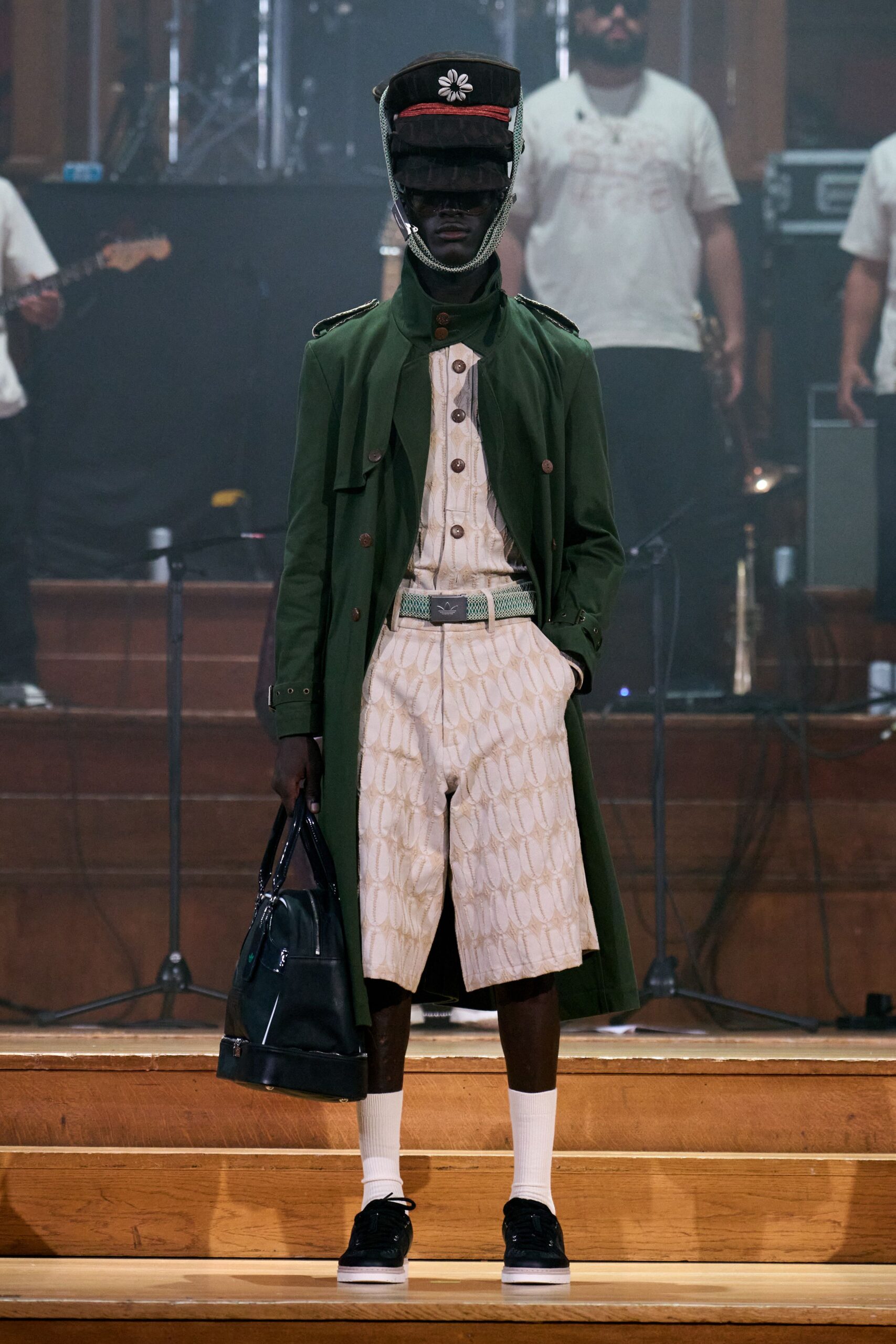 green cotton long-sleeve collared structured buttoned coat
