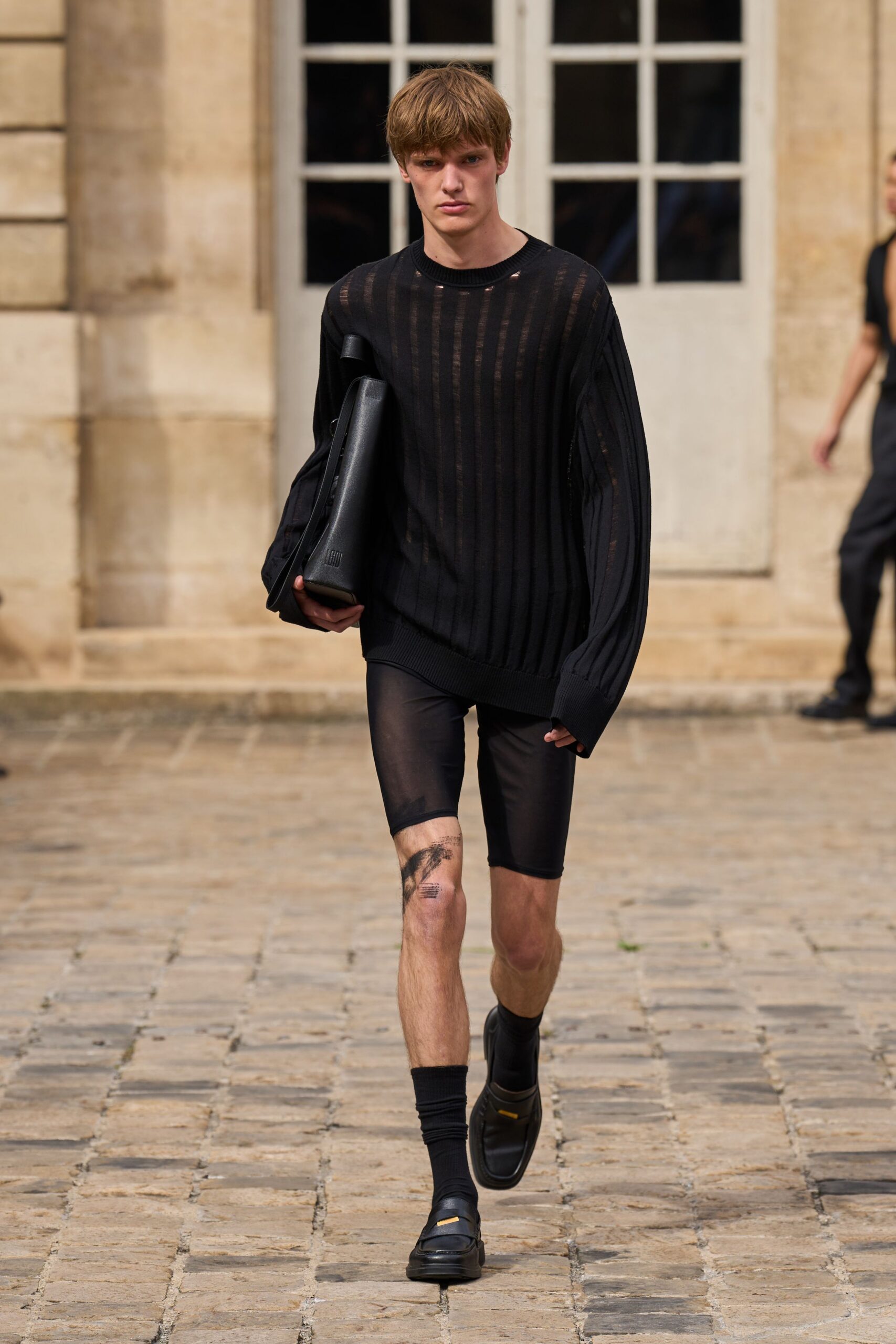 black cotton long-sleeve collared relaxed ribbed top