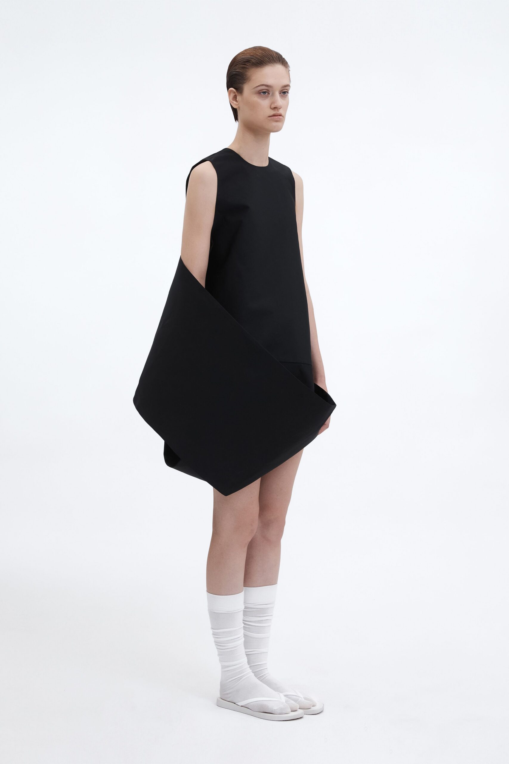 black asymmetric sleeveless dress