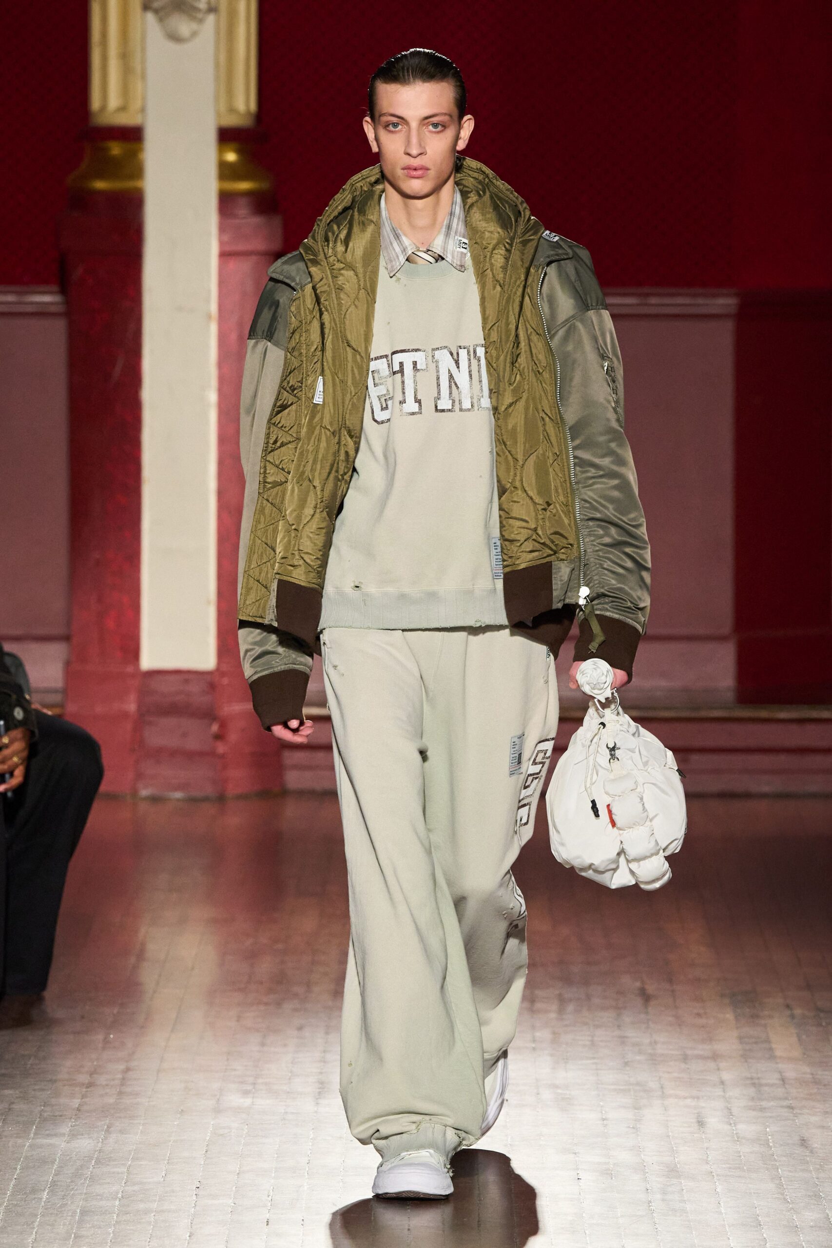 green quilted jacket gray sweater pants