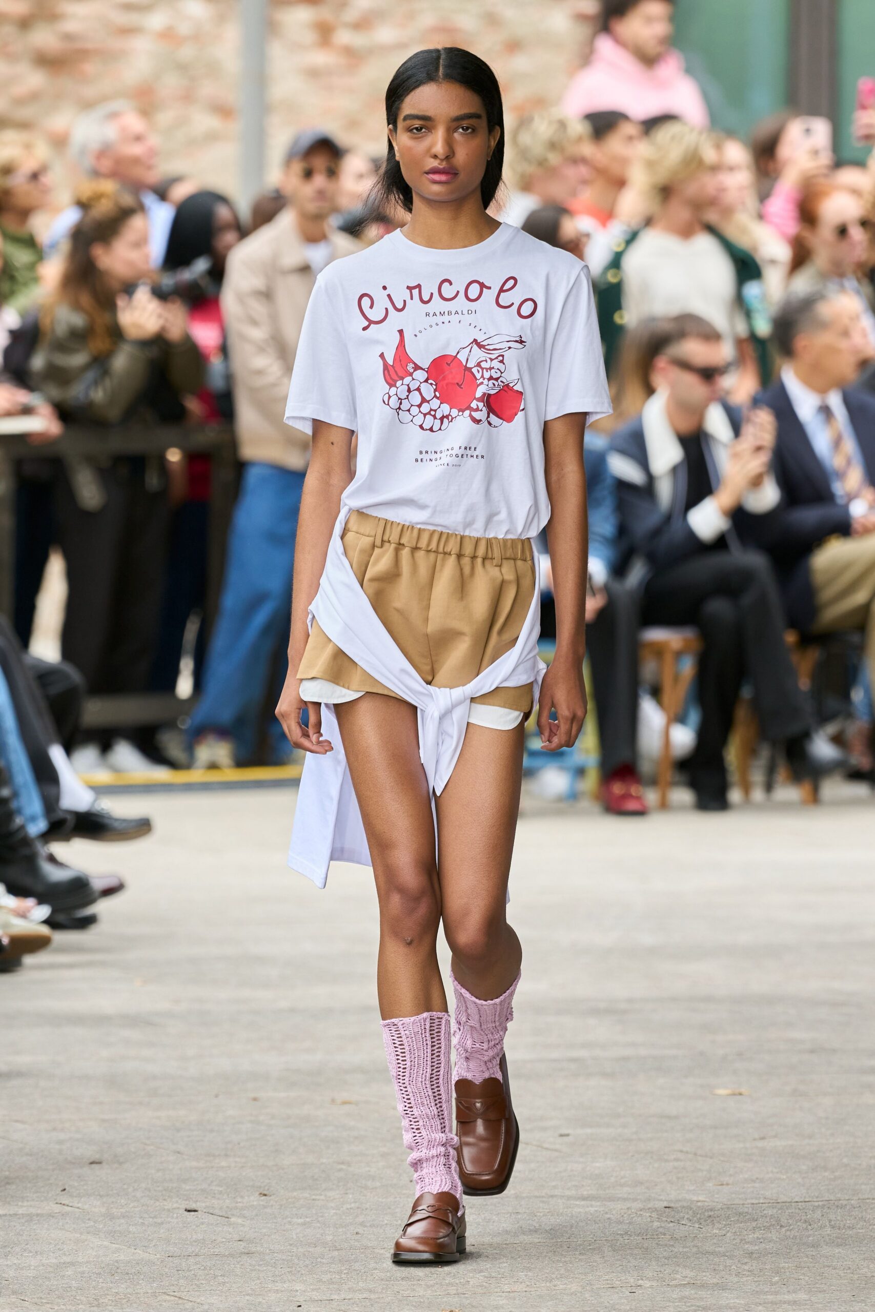white t-shirt with beige shorts