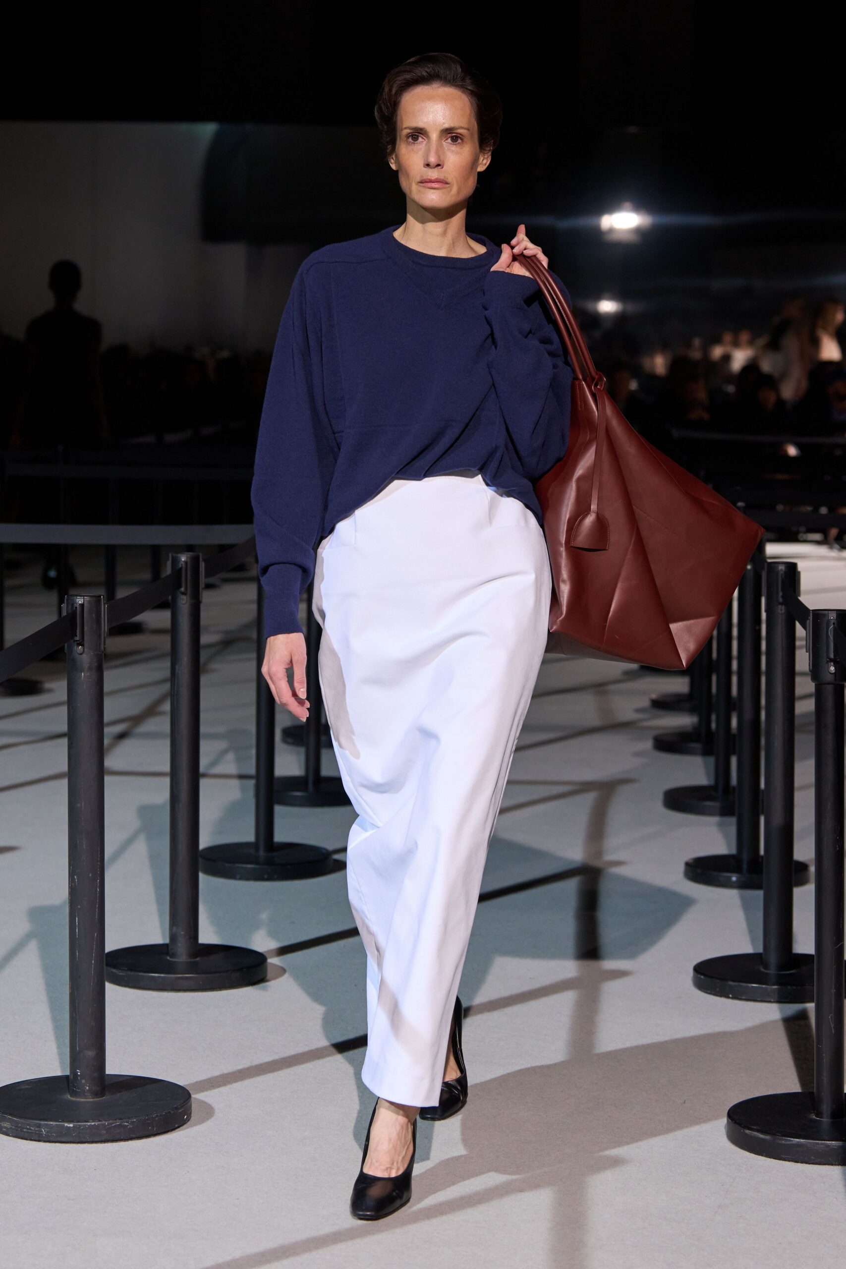 blue relaxed top with white skirt