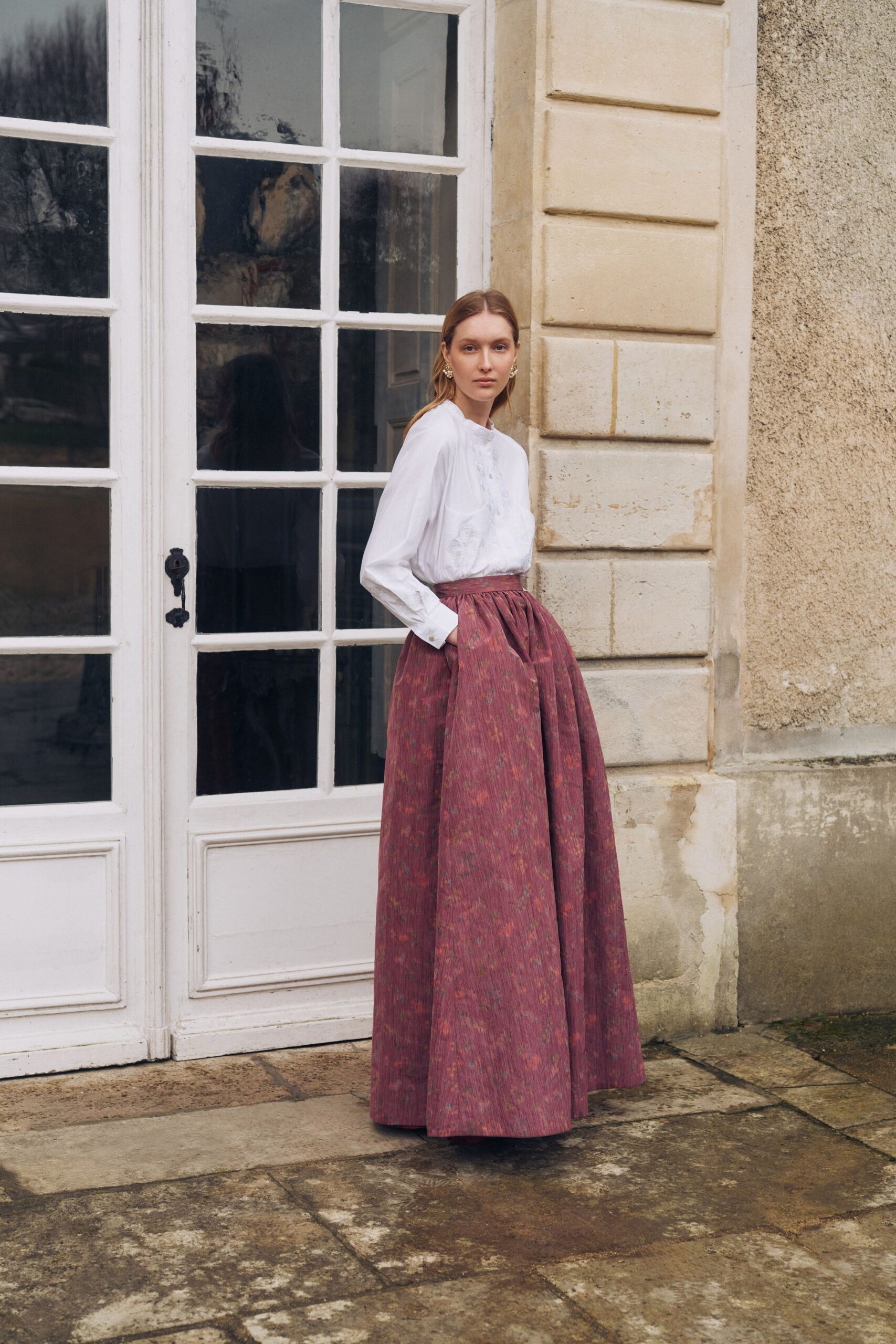 white cotton long-sleeve collared fitted buttoned blouse