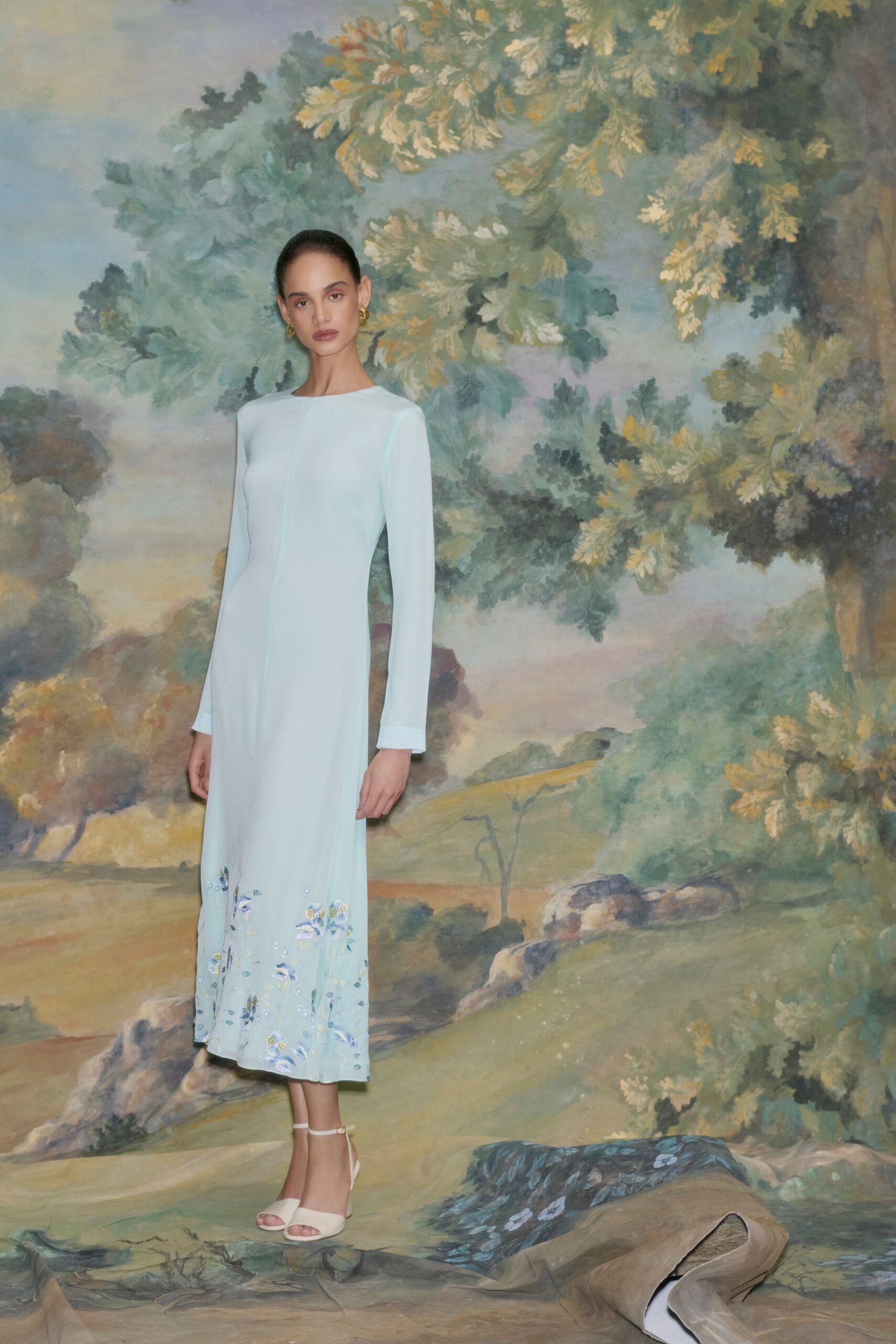 light blue fitted midi dress with embroidery