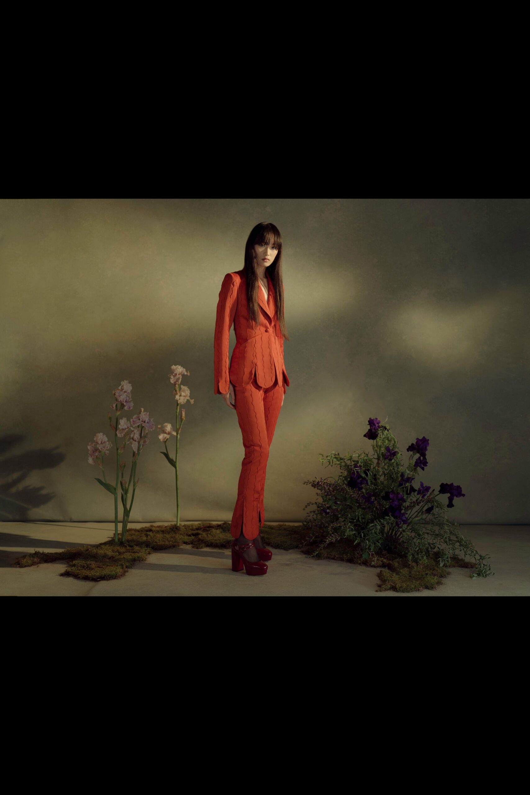 red cotton long-sleeve collared fitted pleated suit