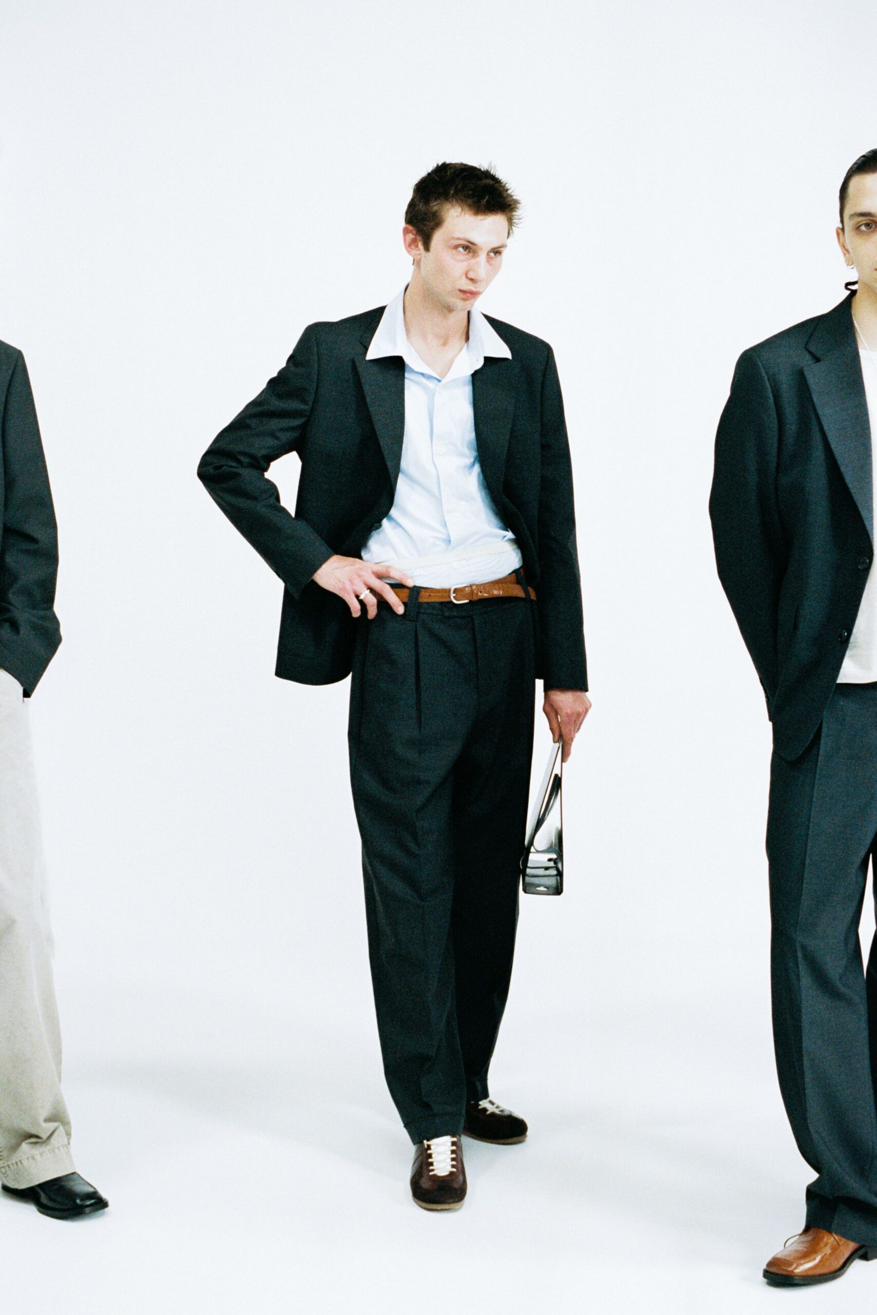 black tailored suit with white shirt