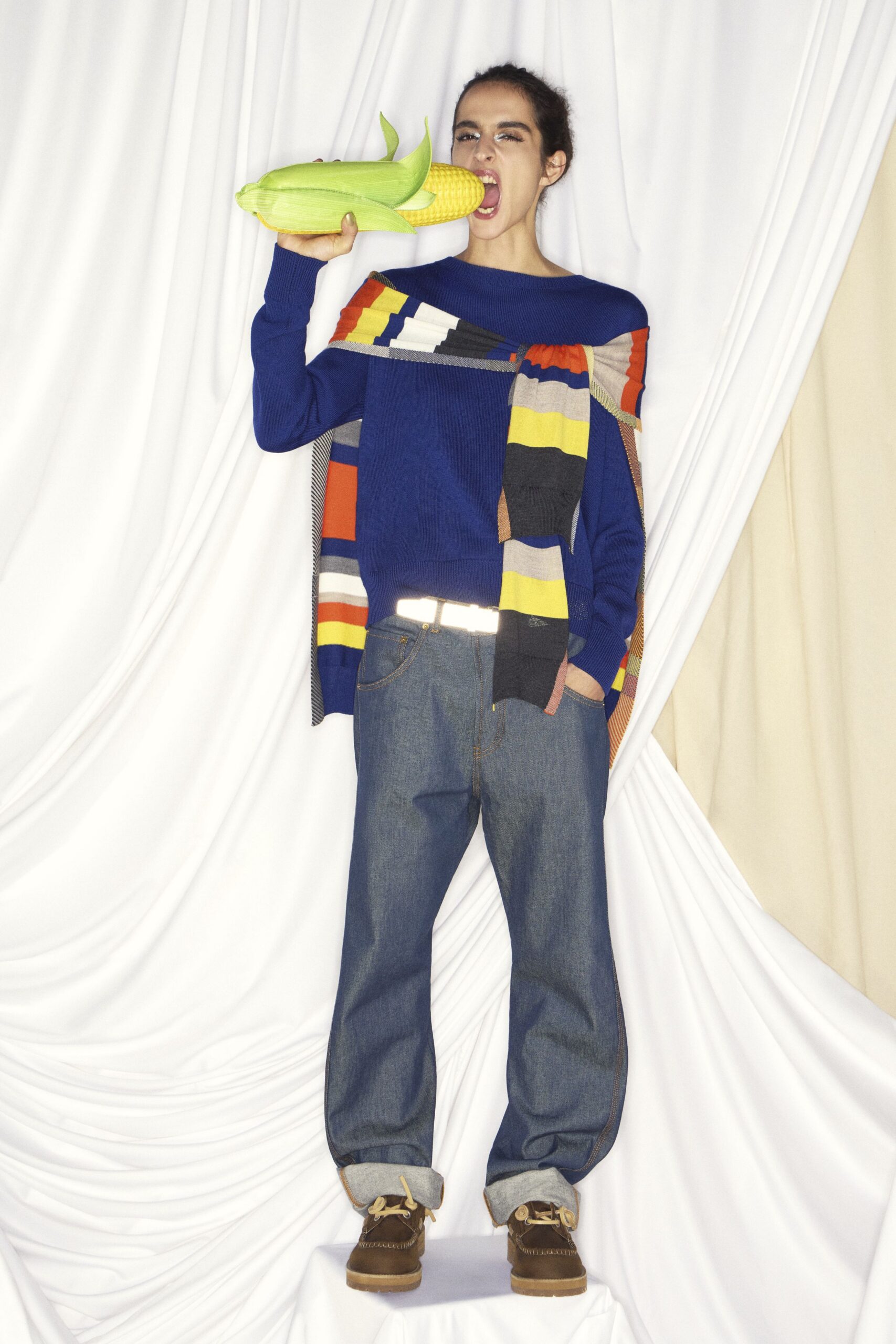 colorful relaxed sweater with denim pants