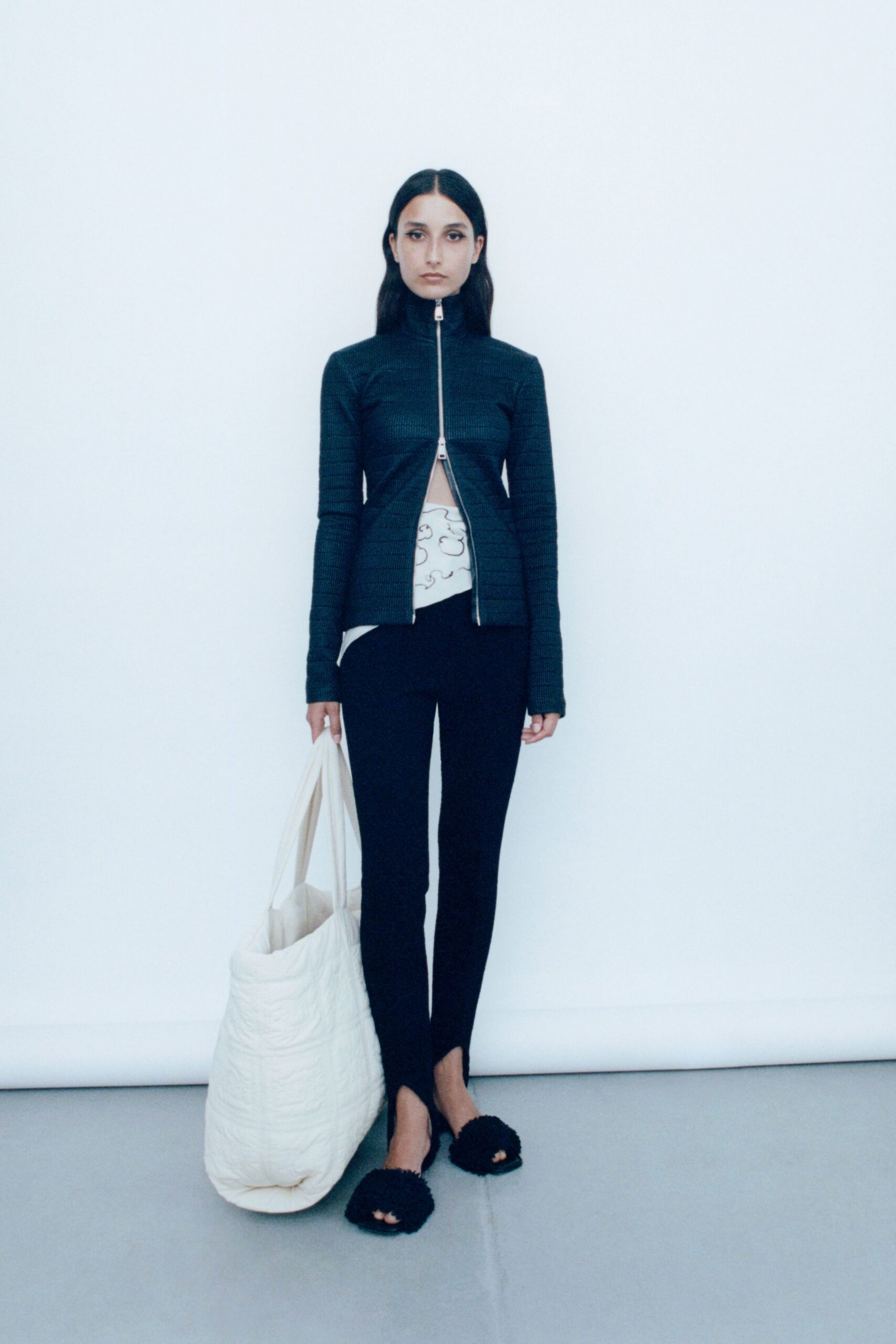 black fitted jacket with leggings