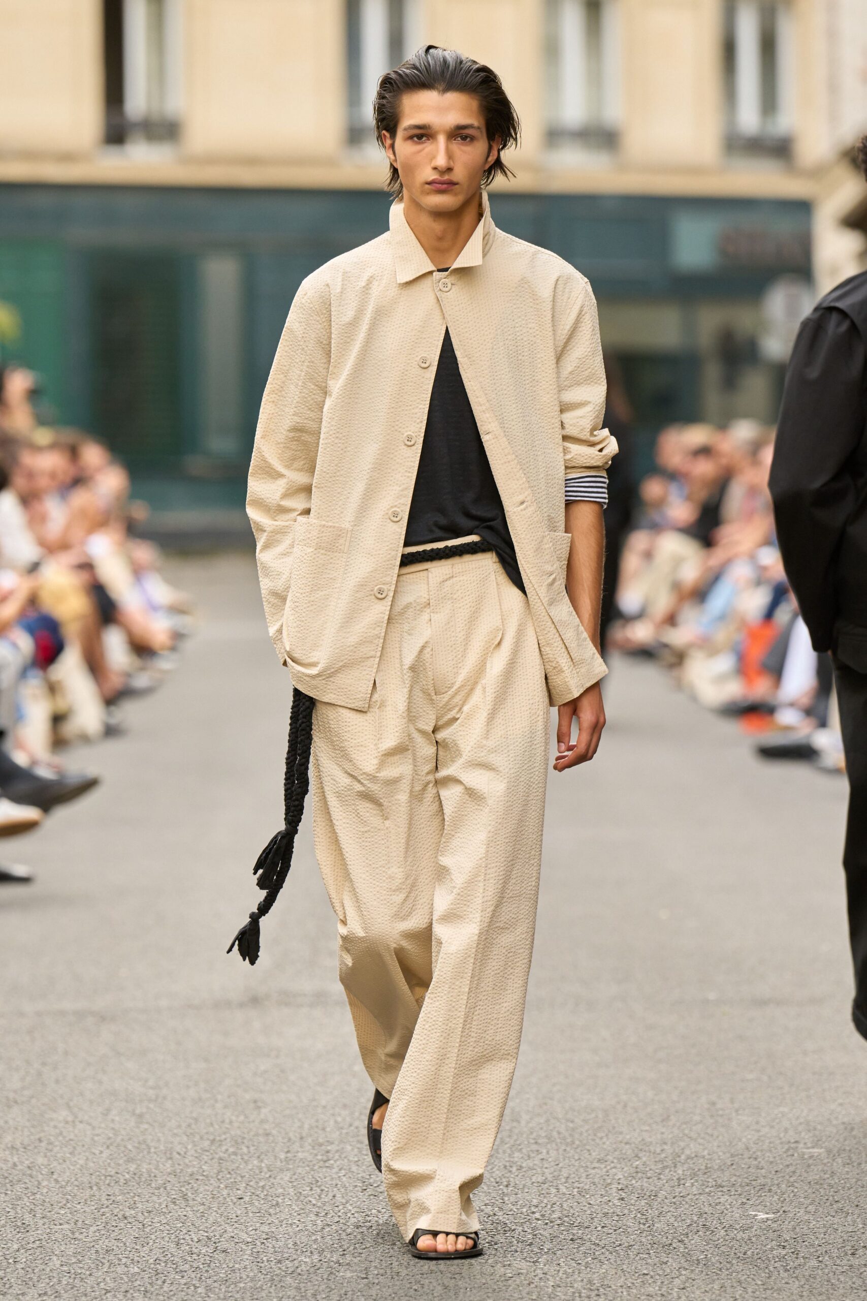beige relaxed jacket with black shirt