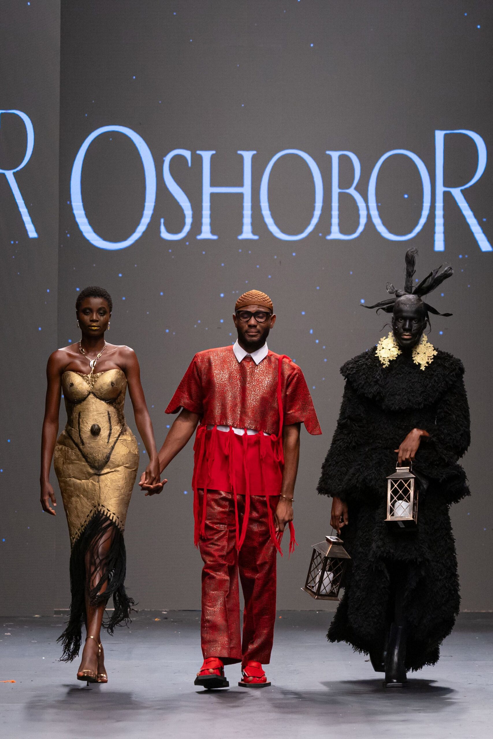 gold silk fitted dress, red top and pants, black fur coat