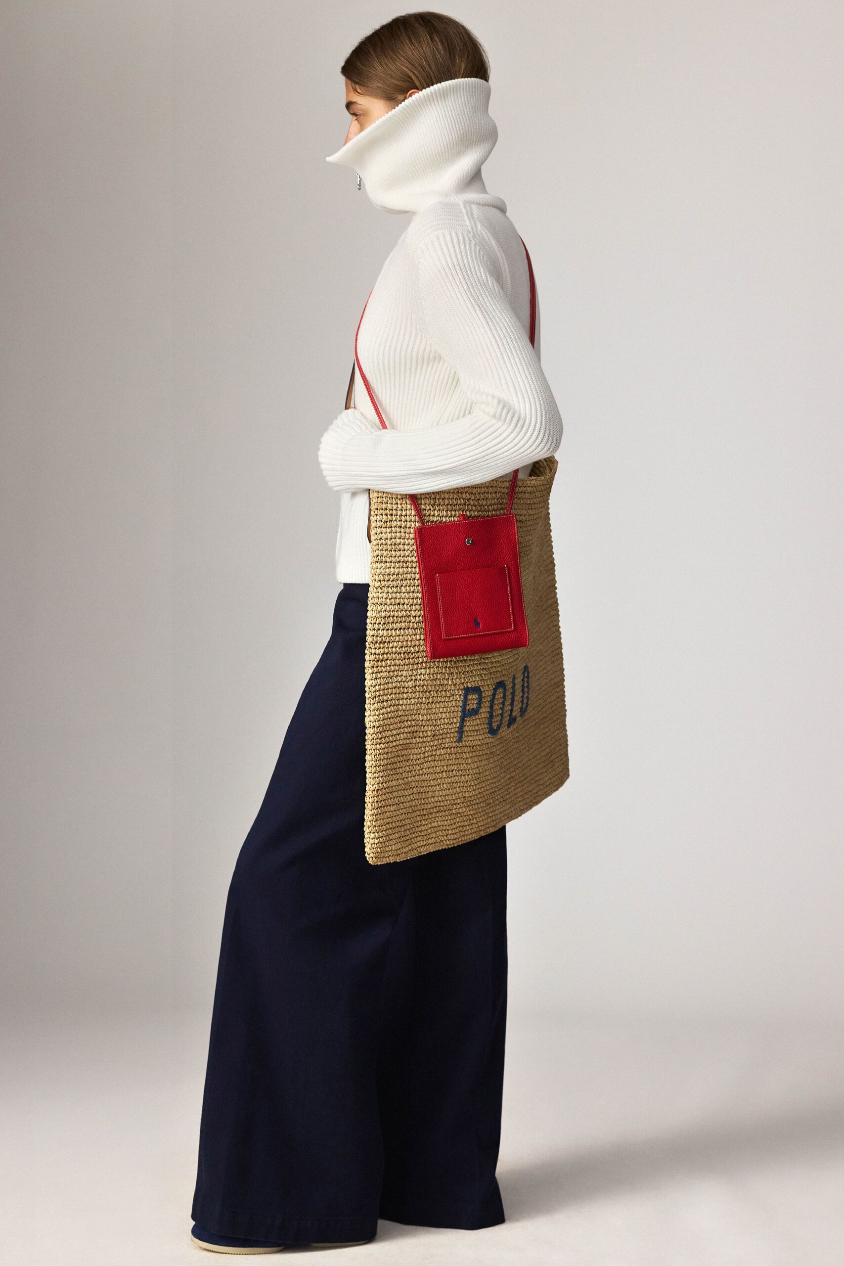 white fitted sweater with navy pants