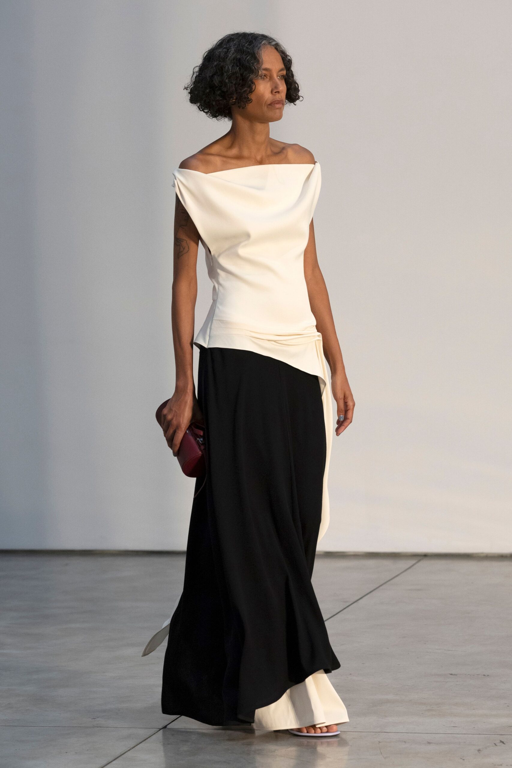 black and white draped gown
