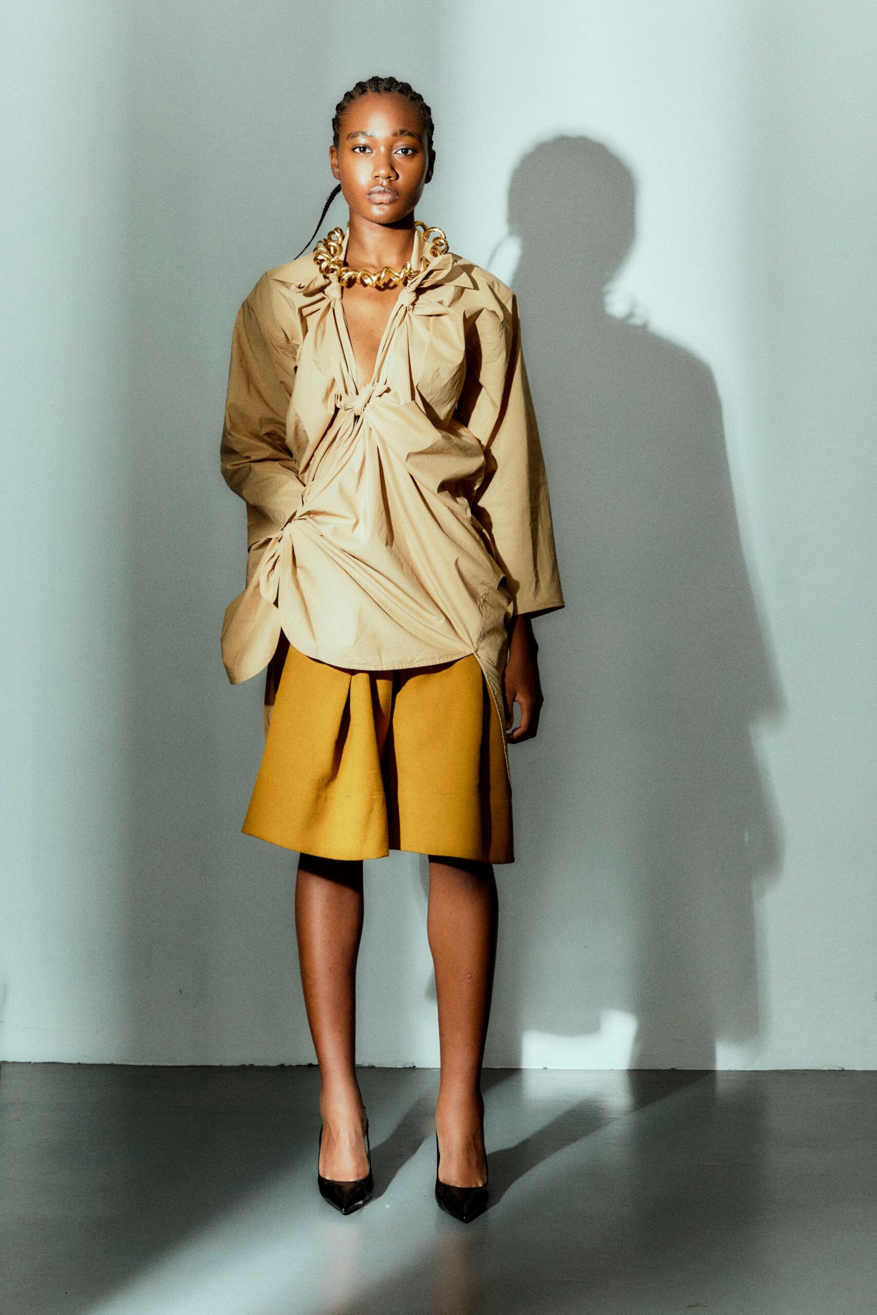 beige cotton long-sleeve v-neck relaxed draped shirt