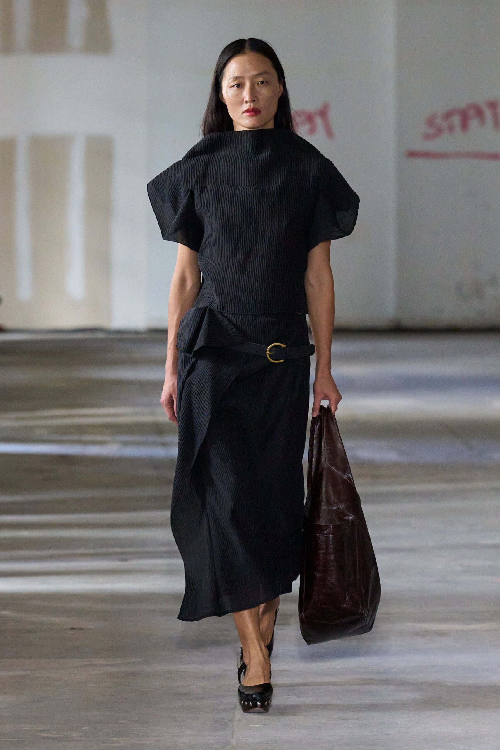 black pleated midi dress with bag