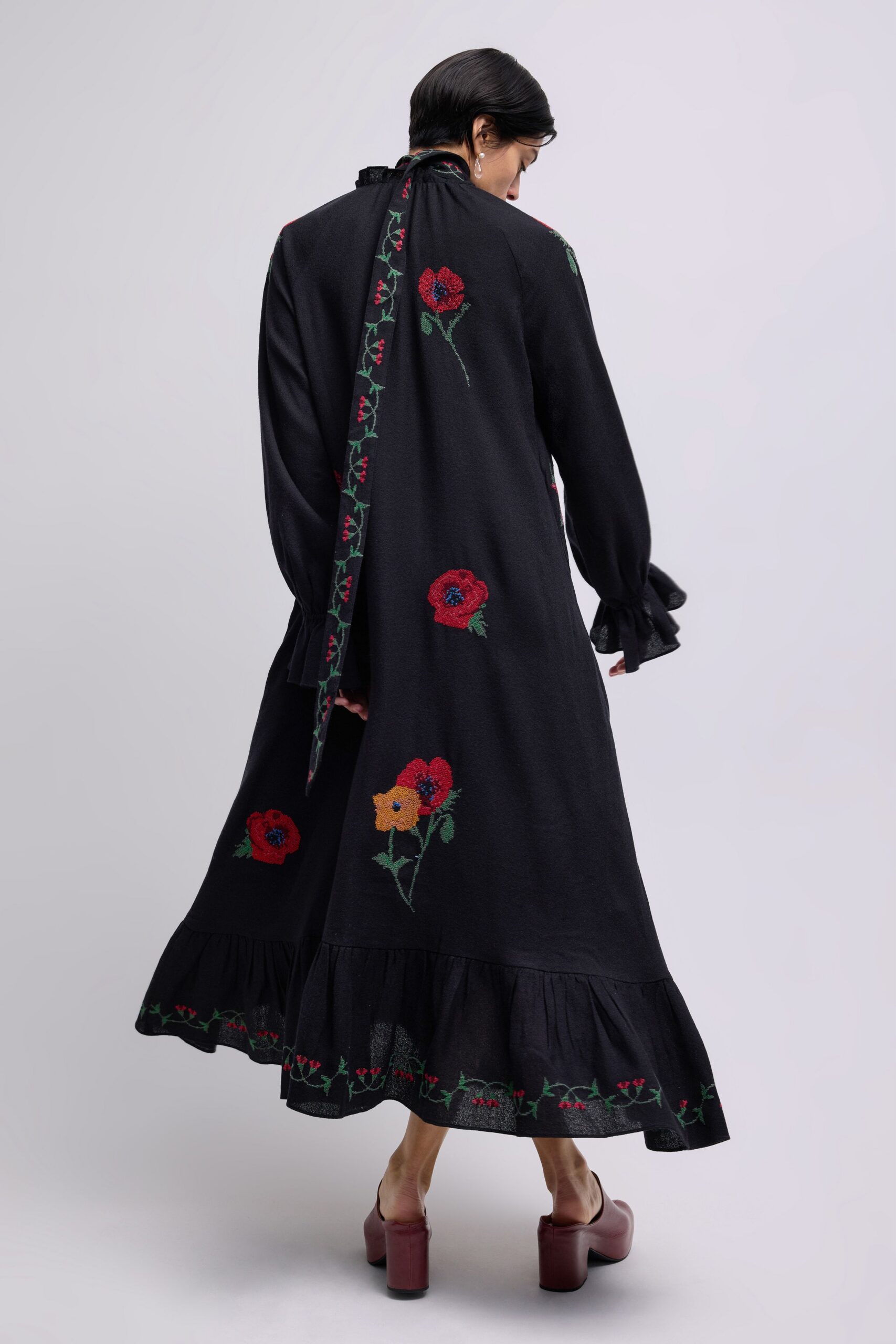 black cotton long-sleeve high-neck relaxed embroidered tiered dress