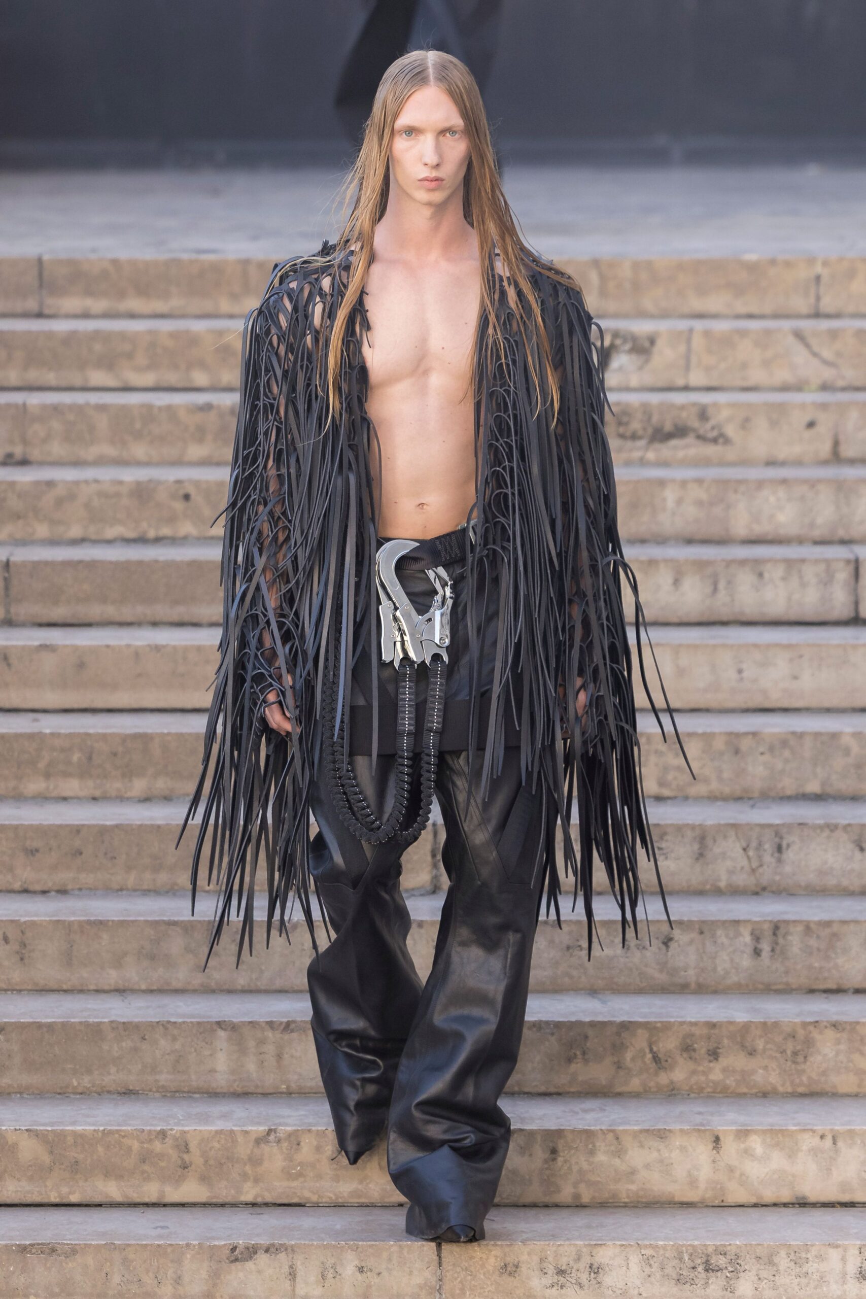 black leather fringed jacket and pants