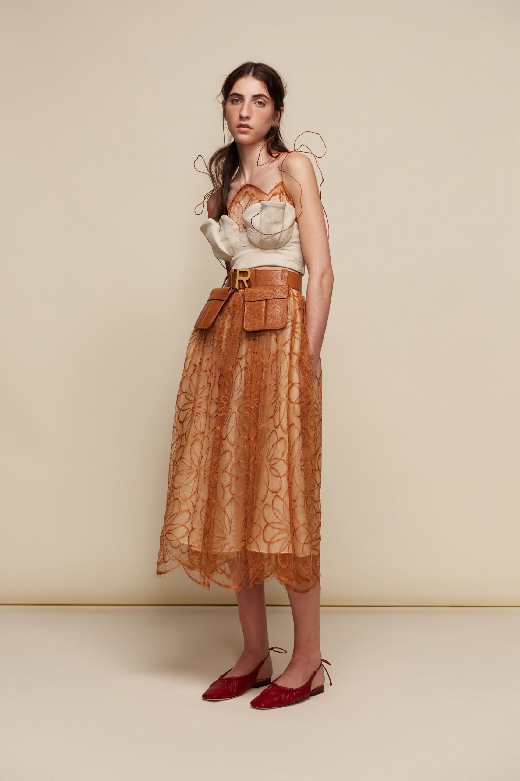 beige silk sleeveless v-neck fitted layered flared dress