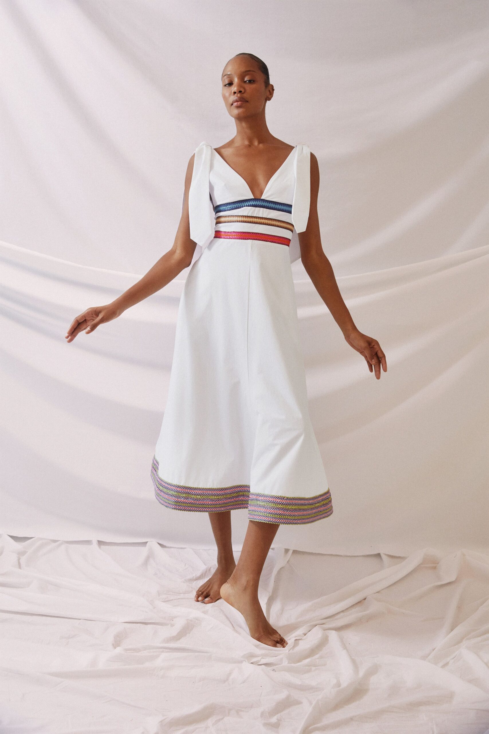 white fitted midi dress