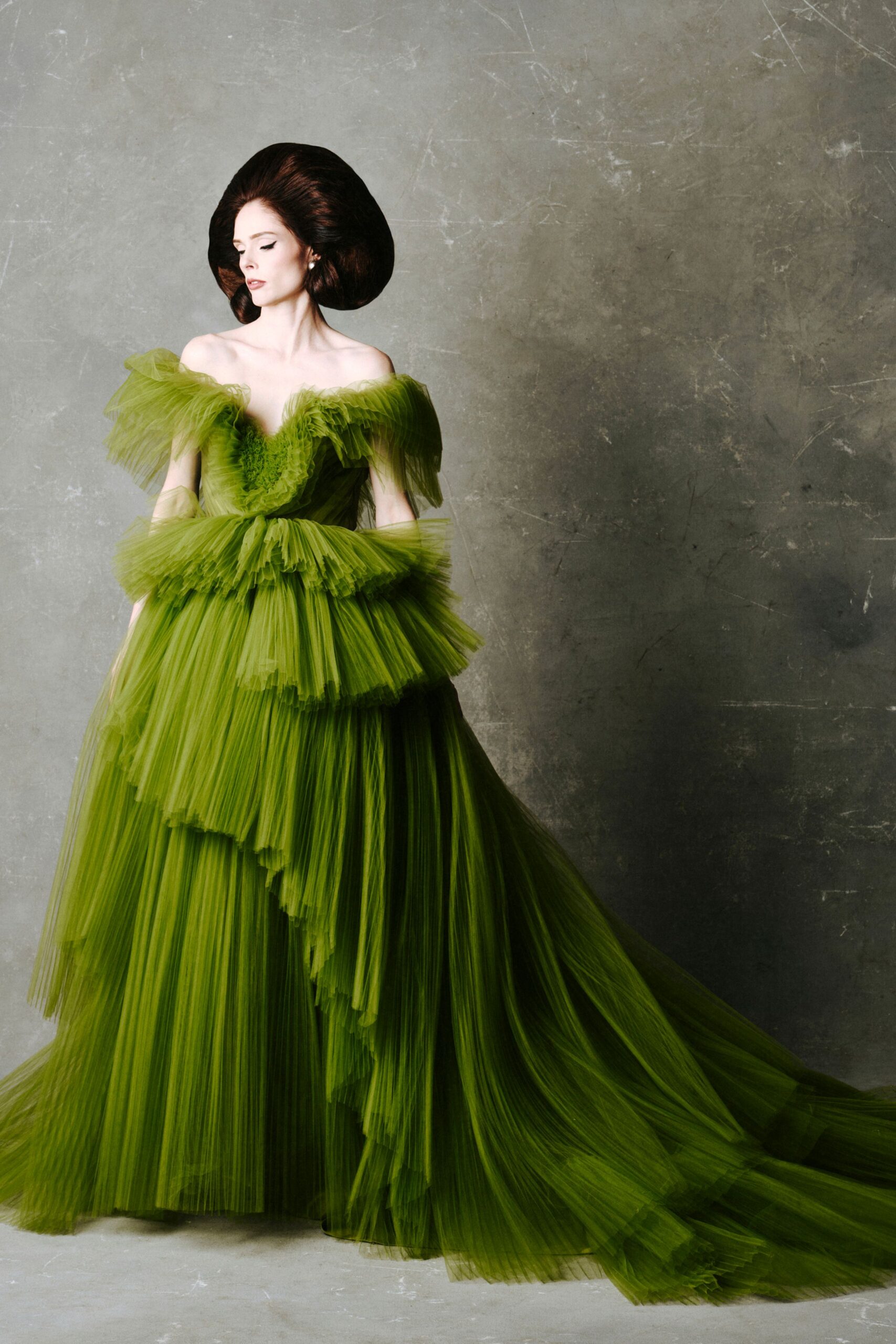 green off-shoulder tiered gown