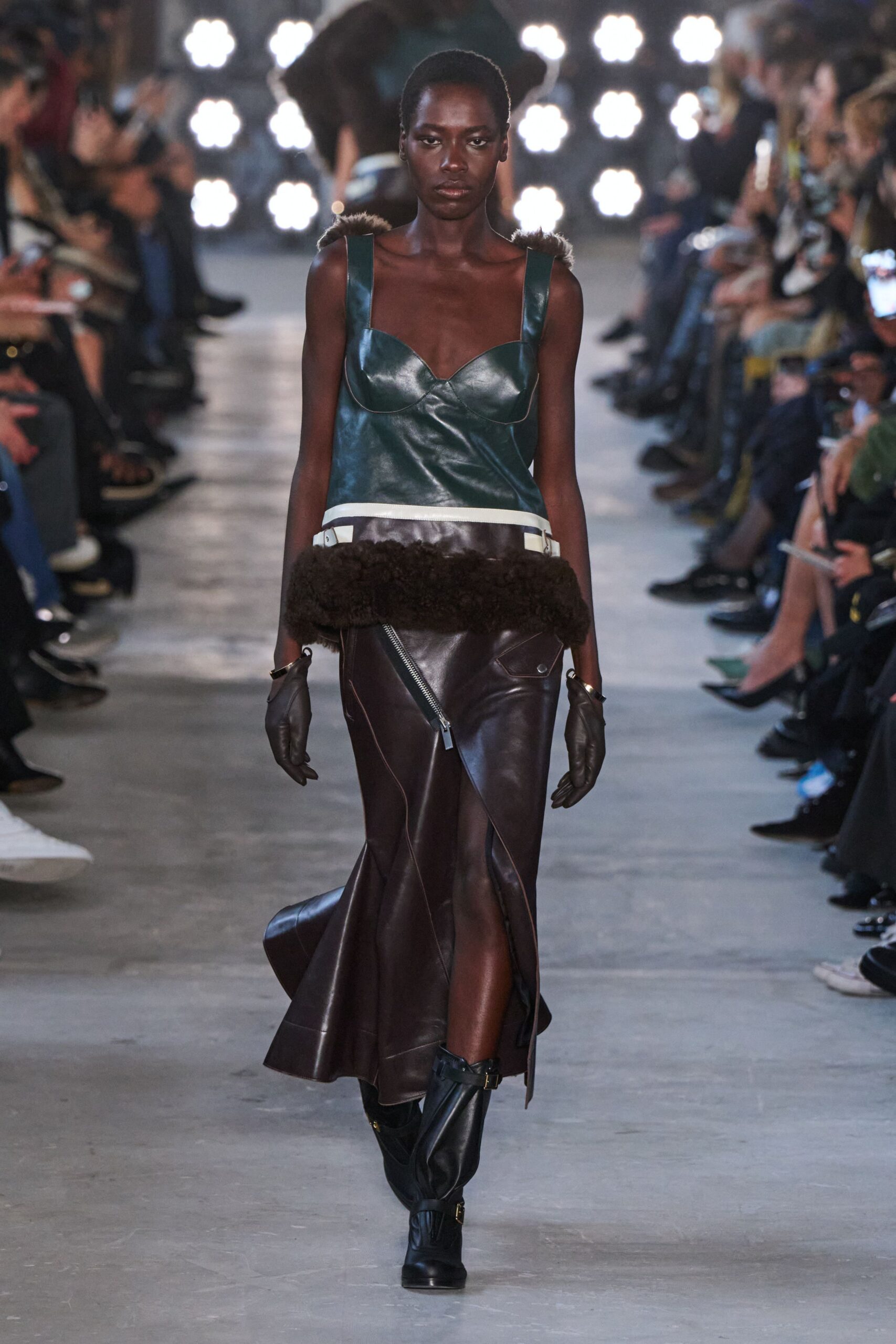 green leather sleeveless v-neck fitted top