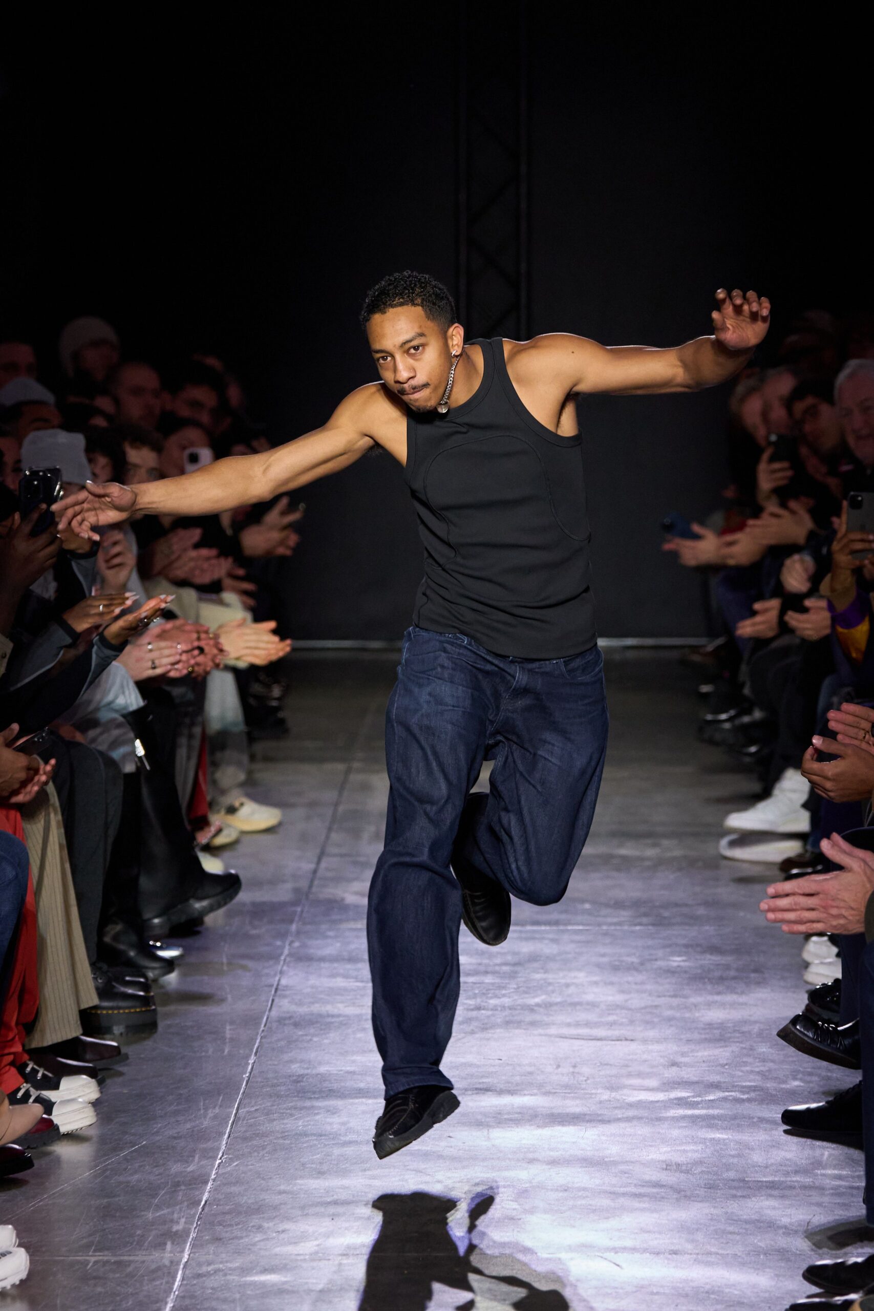 black tank-top with blue jeans
