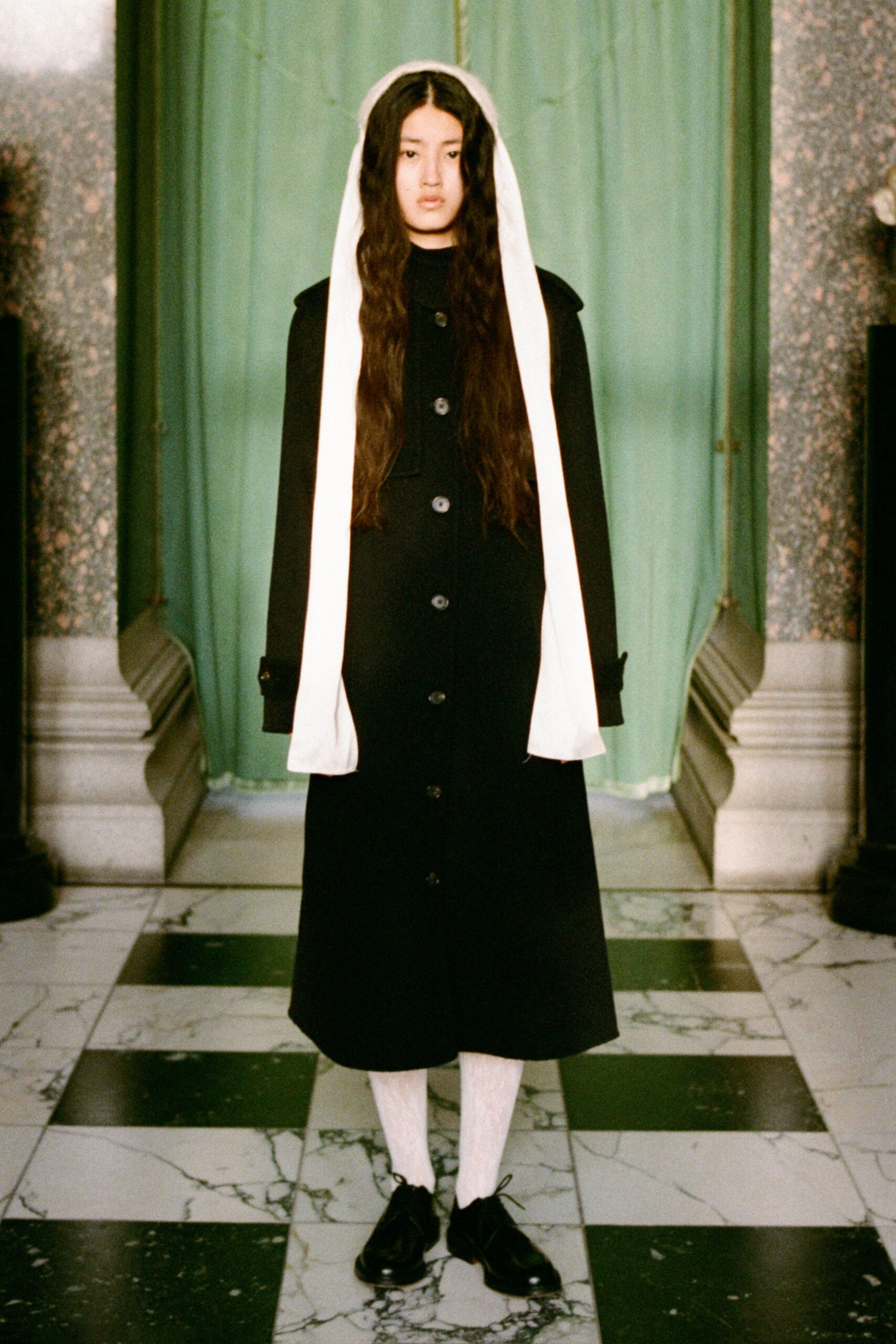black wool long-sleeve collared fitted buttoned maxi coat