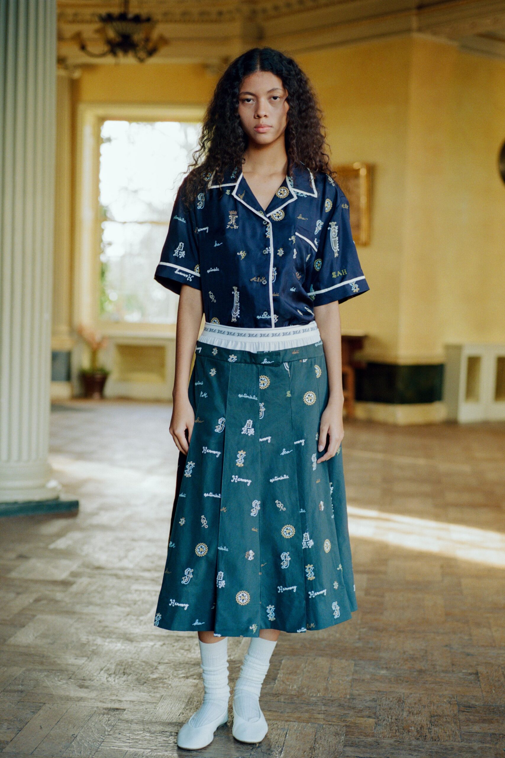 green cotton fitted pleated printed midi skirt