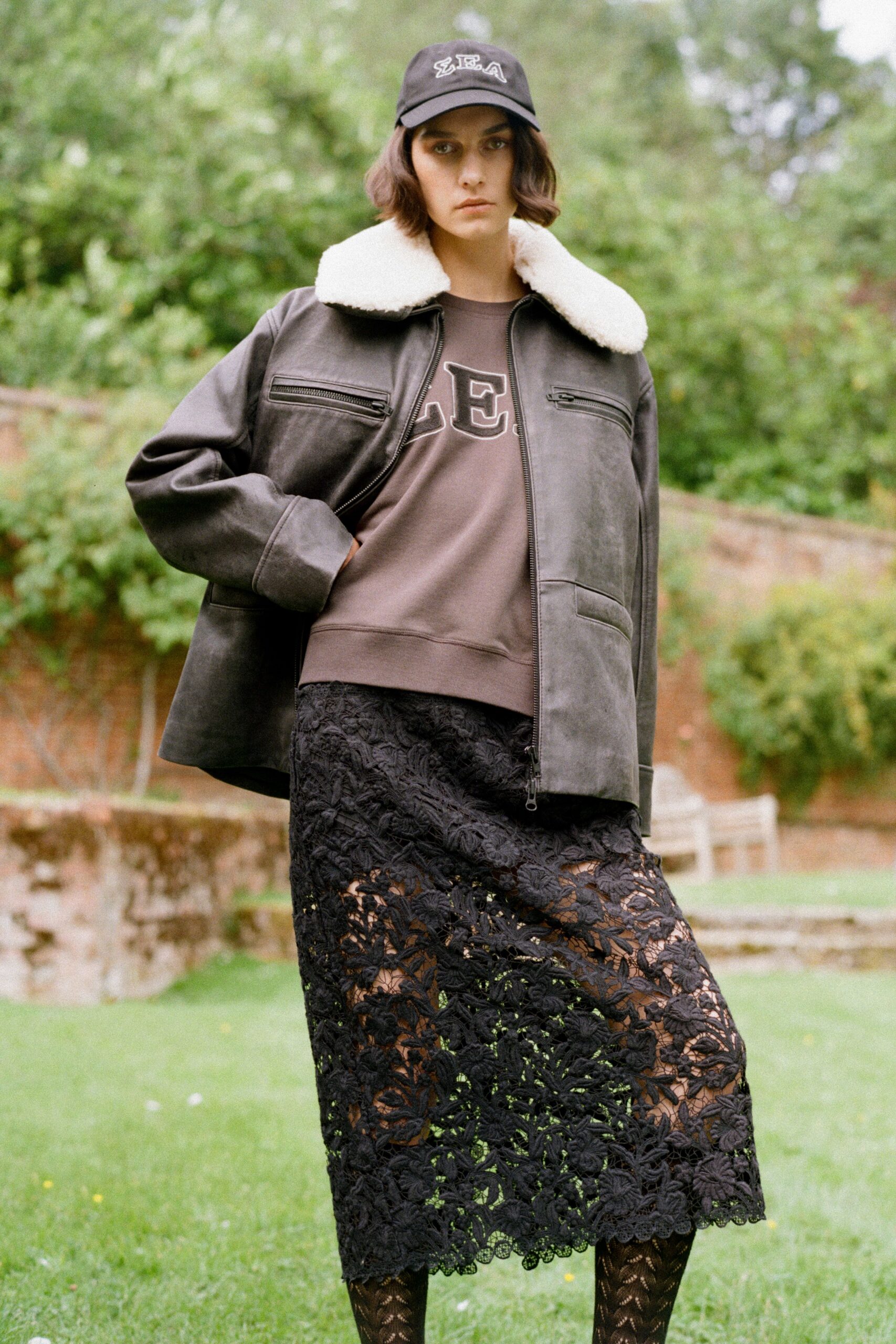 black leather jacket with lace skirt