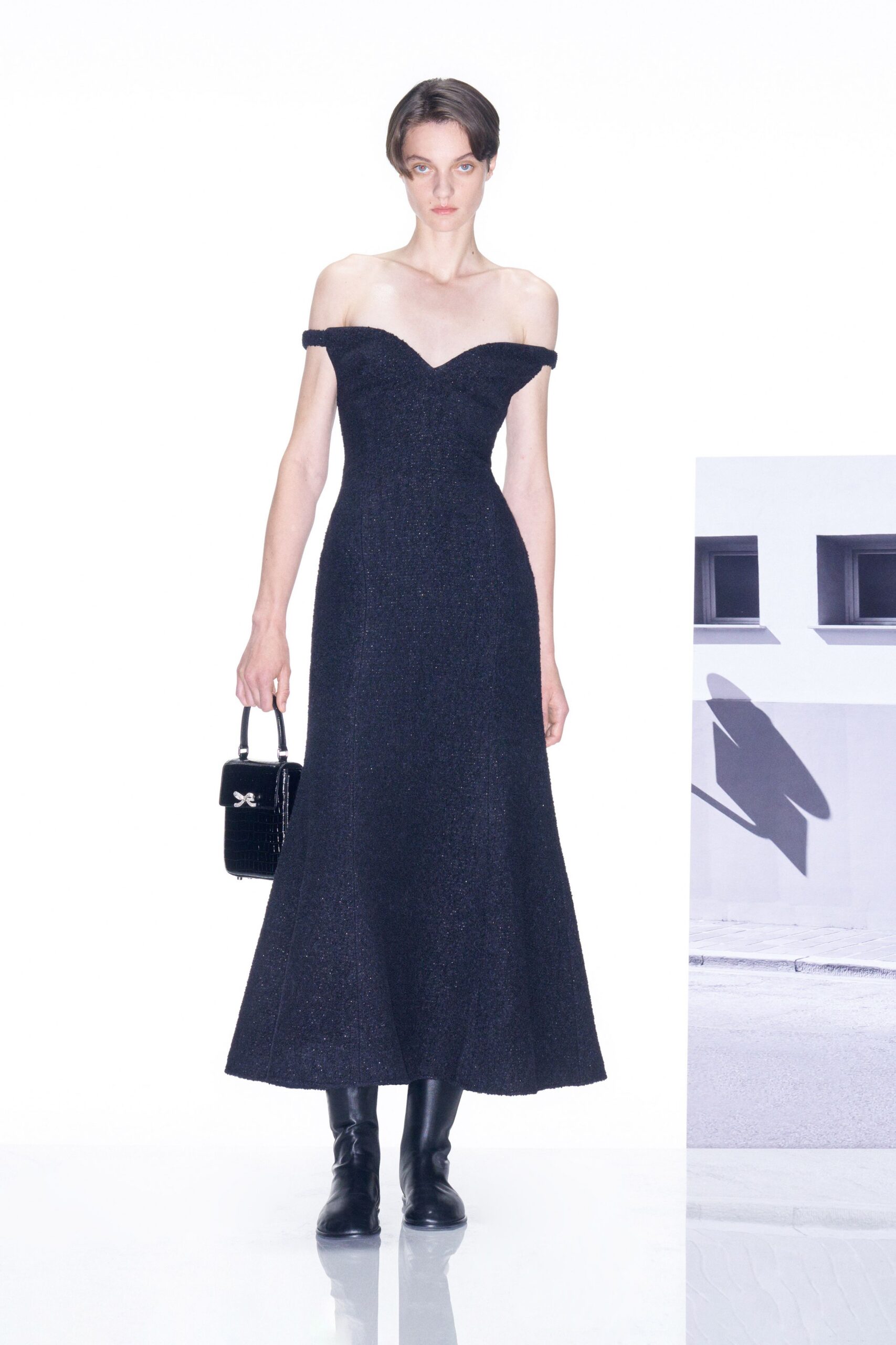 black silk off-shoulder v-neck fitted flared shiny gown