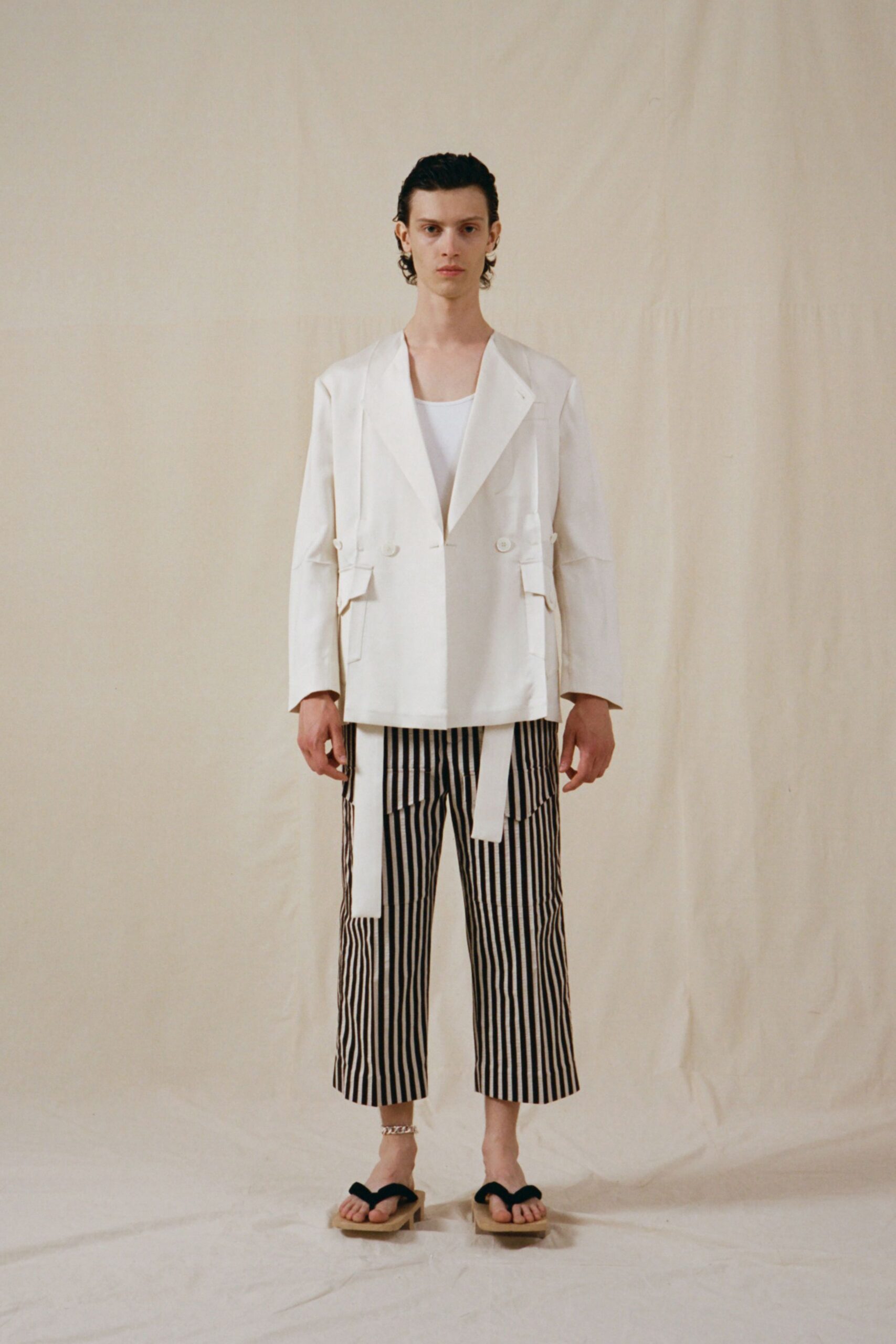 white blazer with striped pants