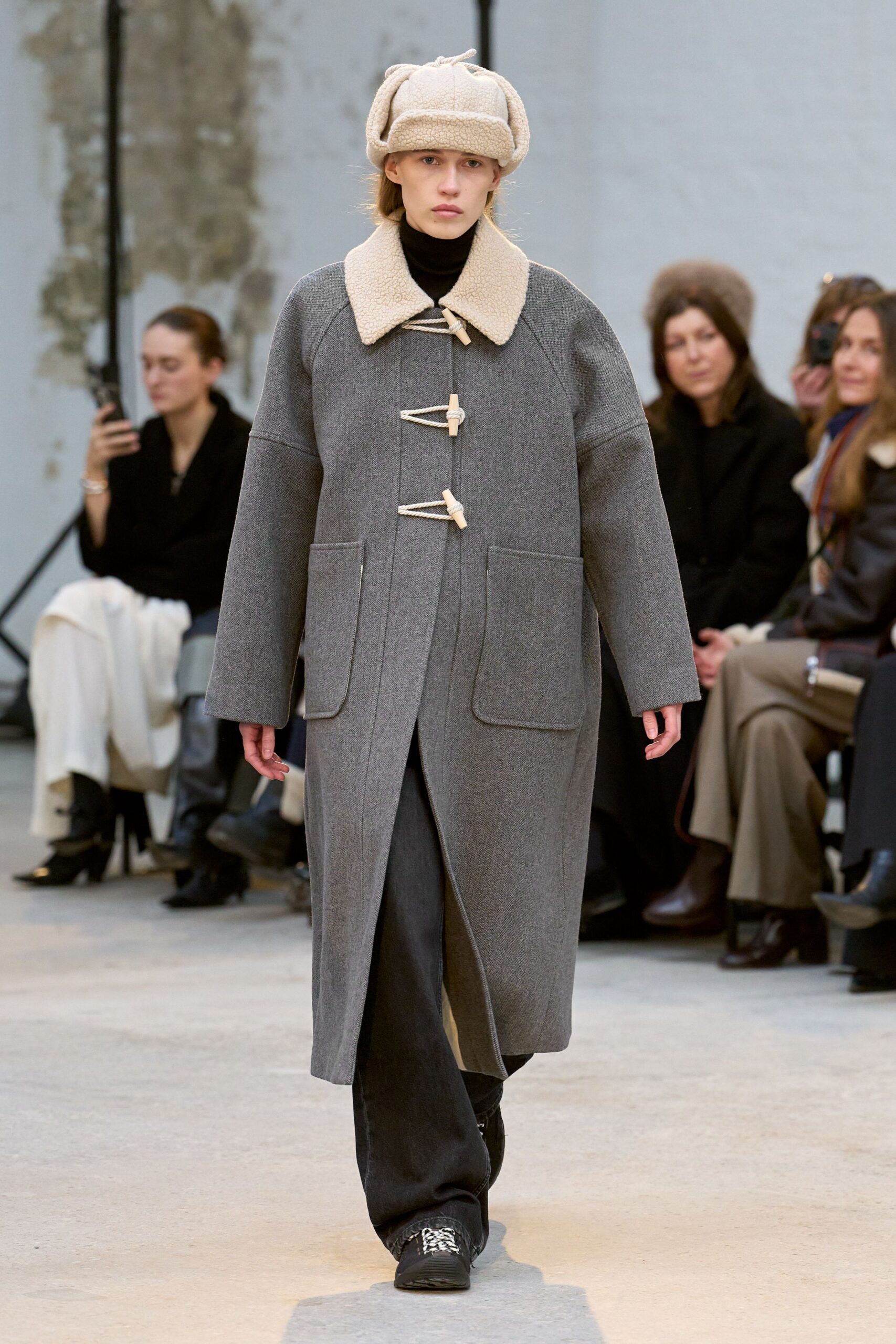 gray wool coat with black turtleneck