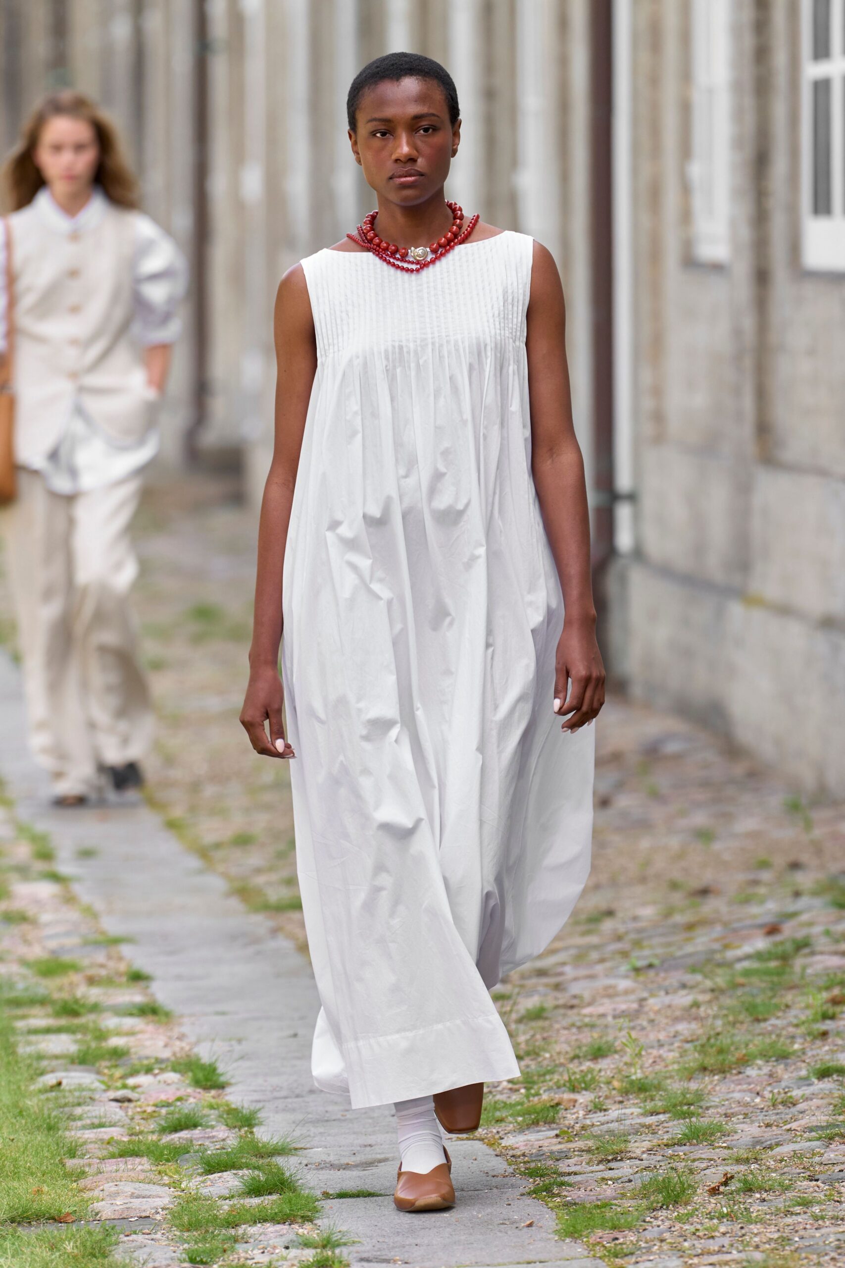 white relaxed maxi dress with brown shoes