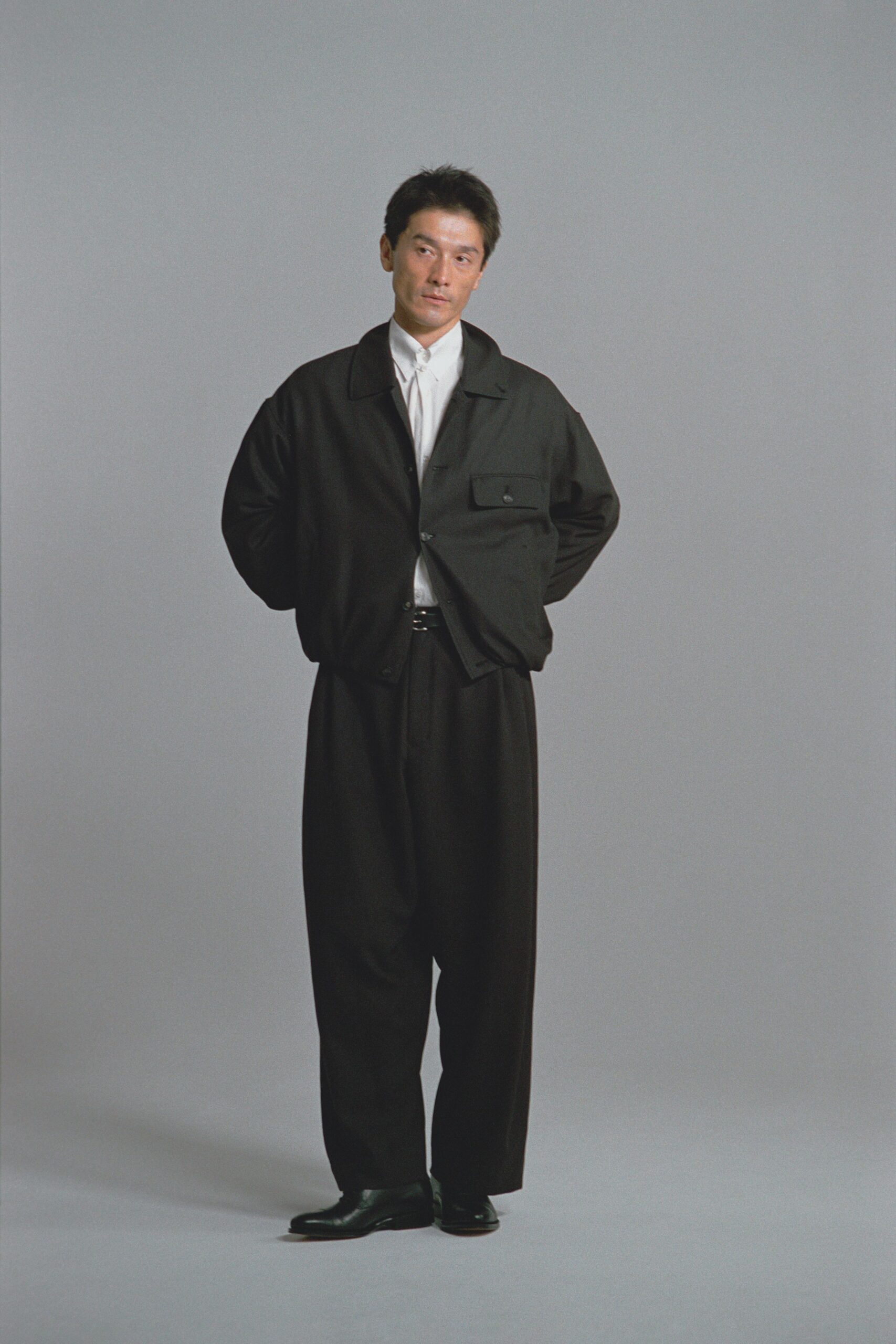 black relaxed jacket with white shirt
