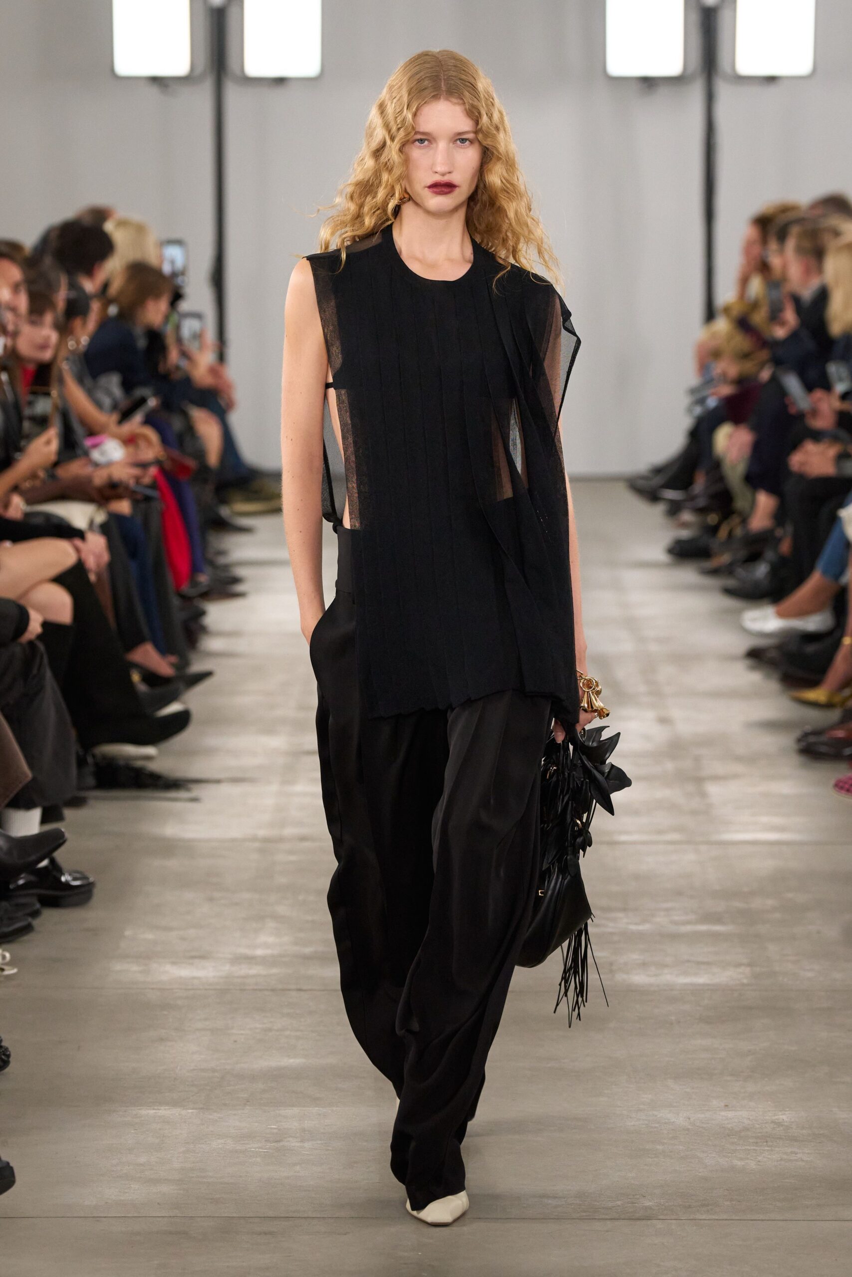black pleated top with relaxed pants