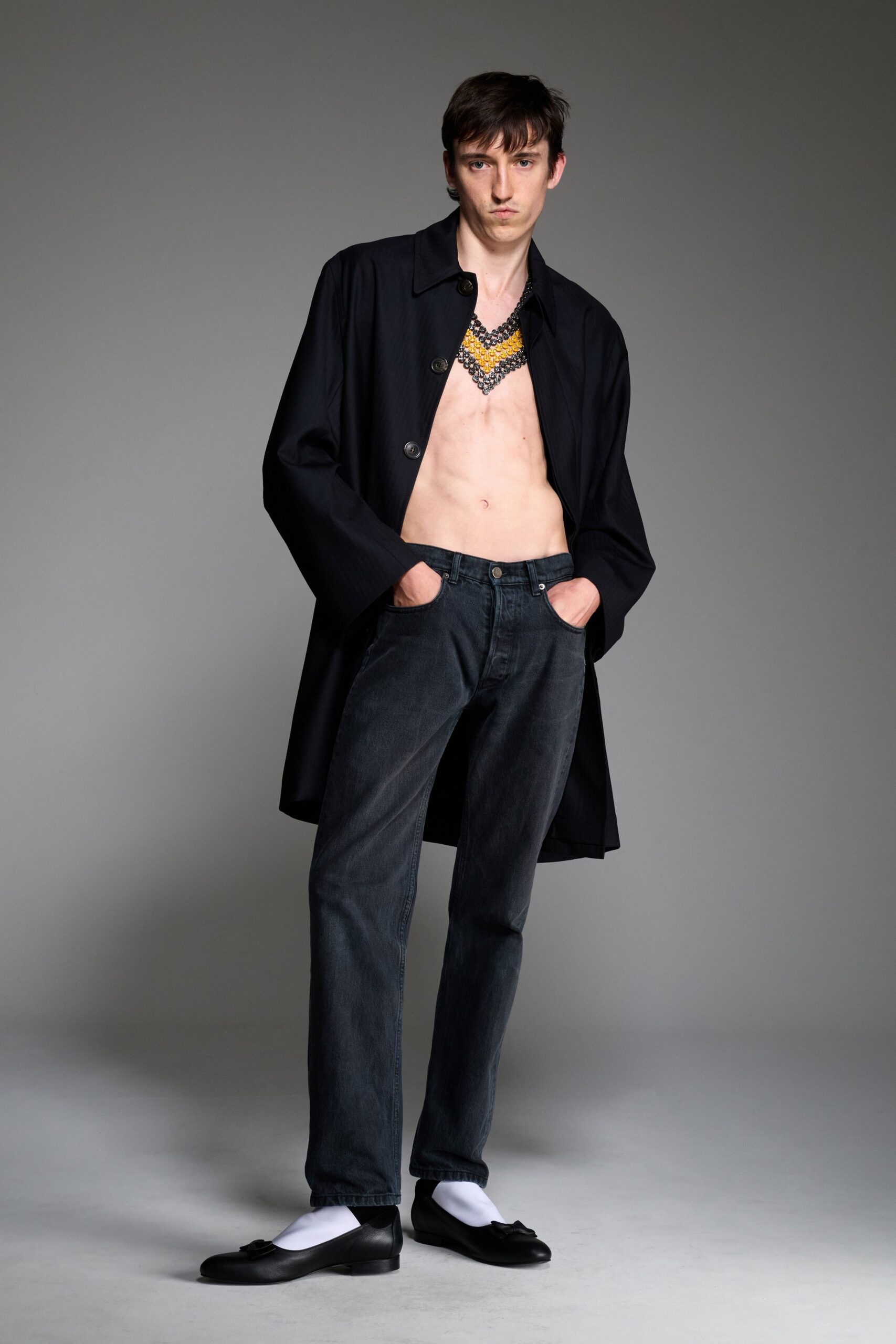 black coat with denim pants