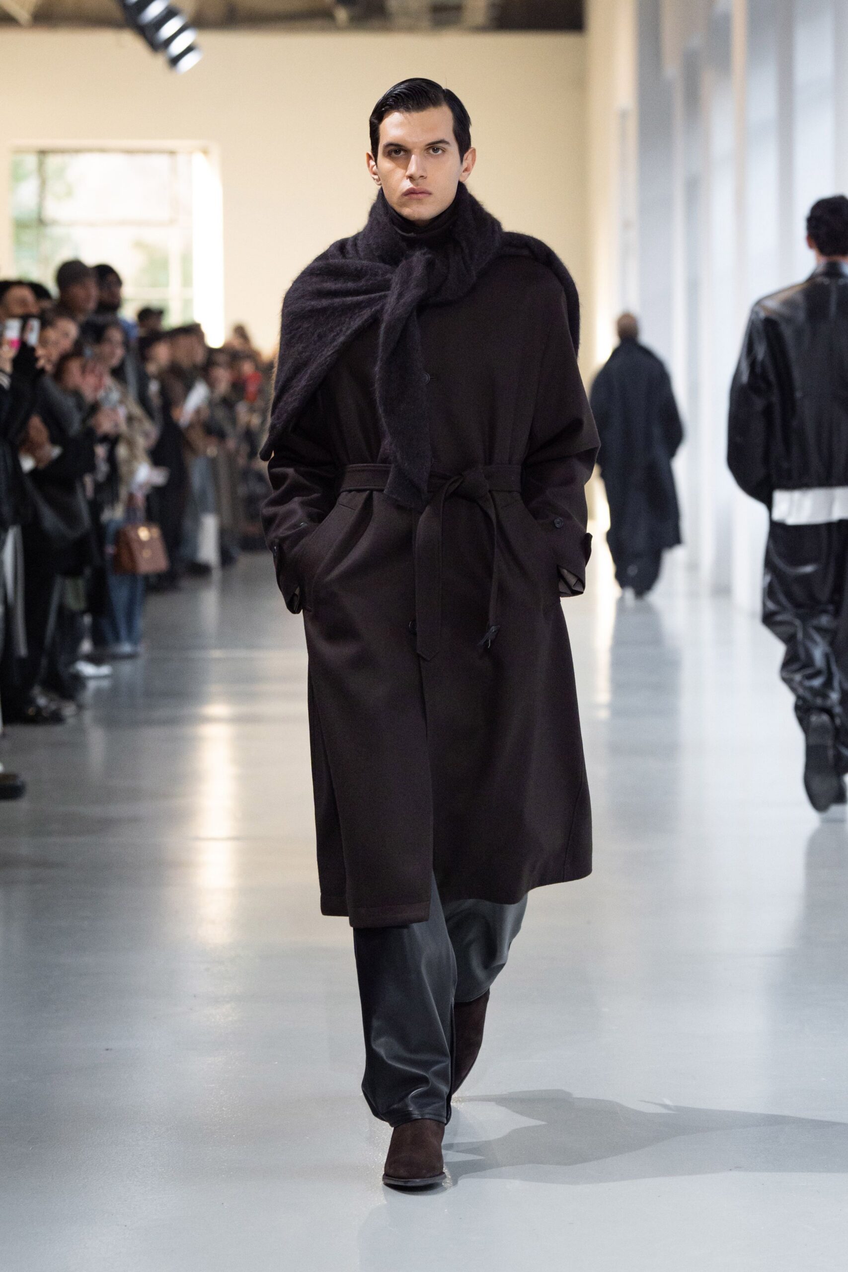 black wool coat with leather pants