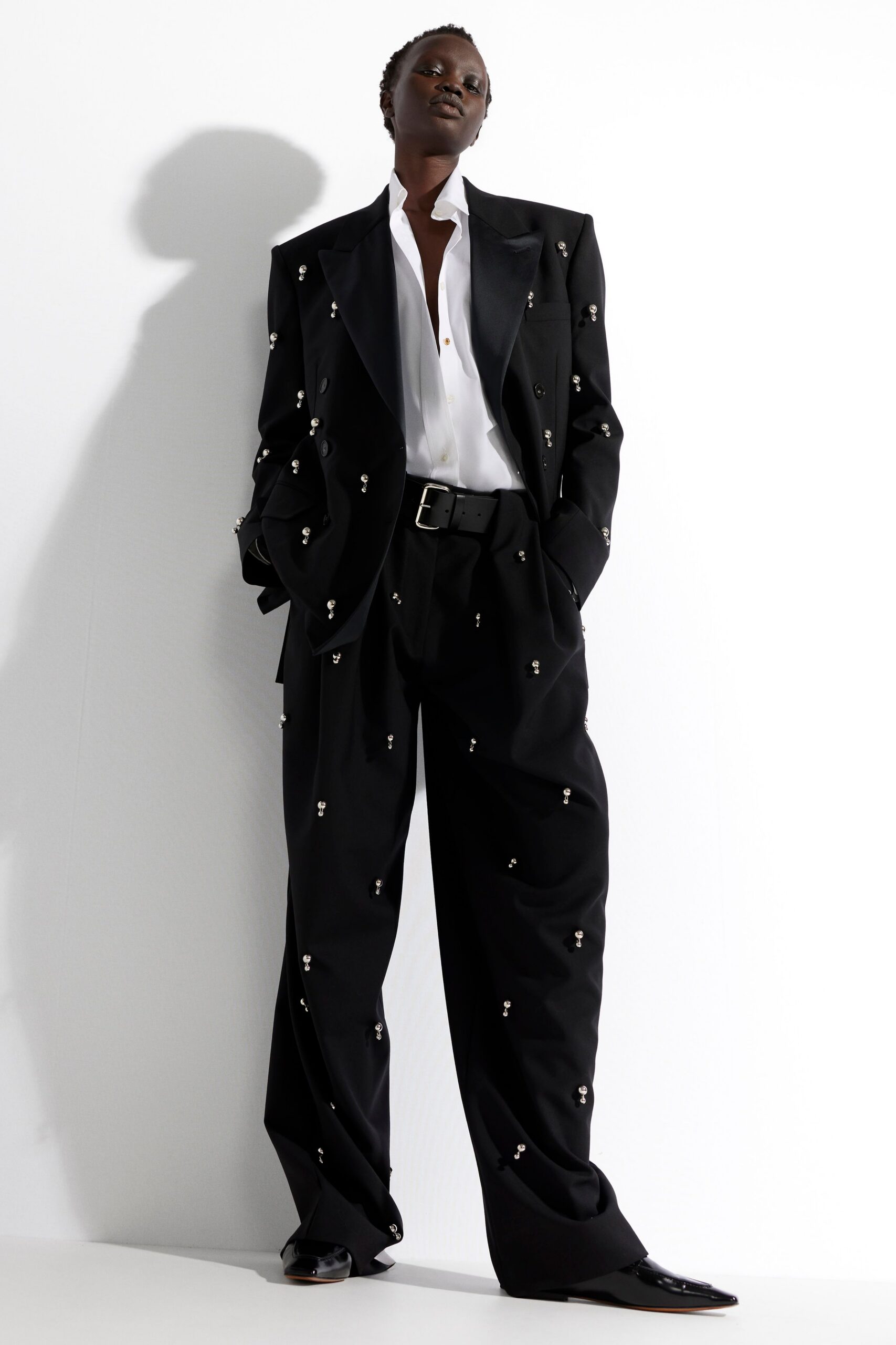 black tailored suit with white shirt